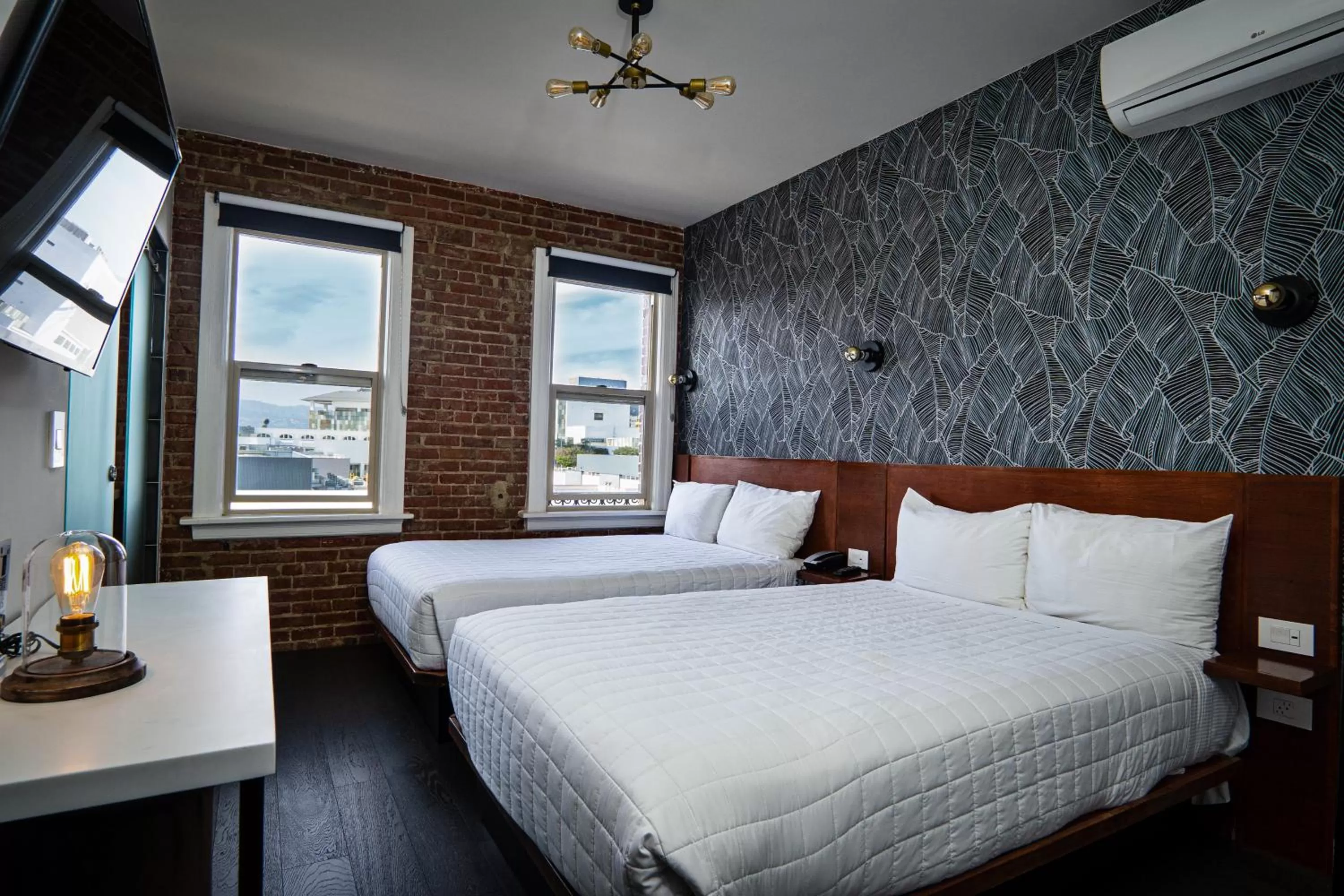 Bed in H by H Hospitality