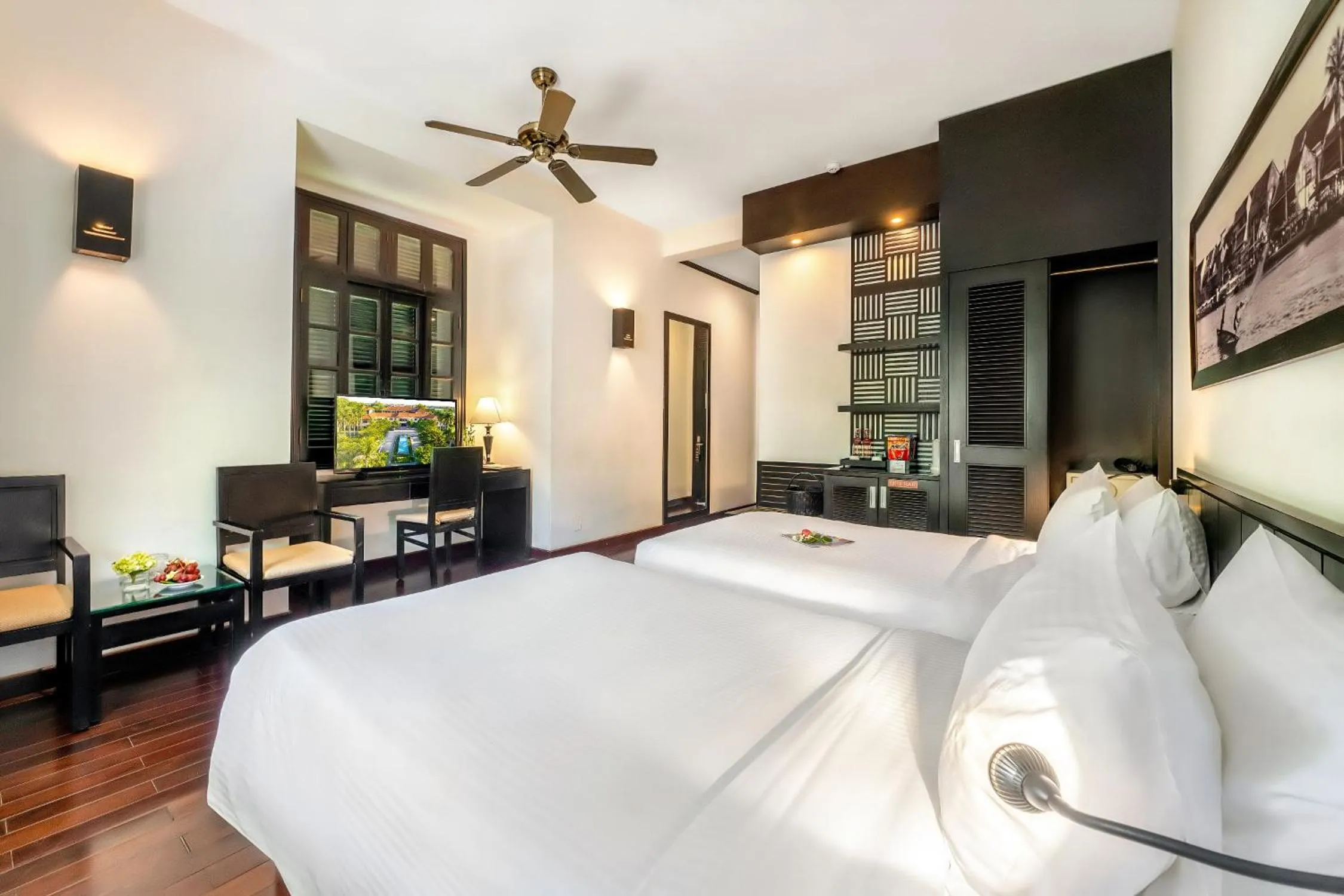 Bed in HOI AN HISTORIC HOTEL