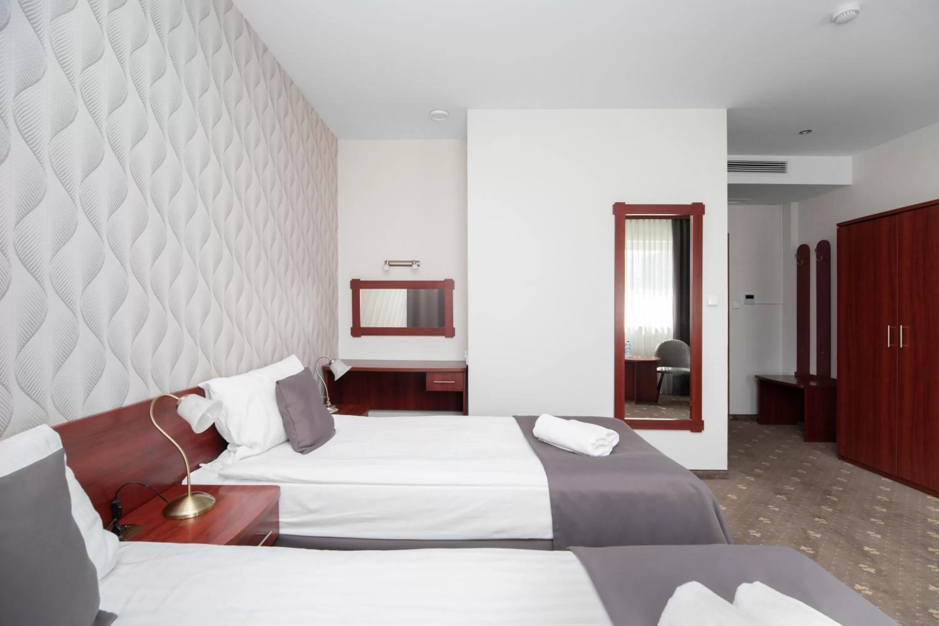 Bed in Hotel Maraton