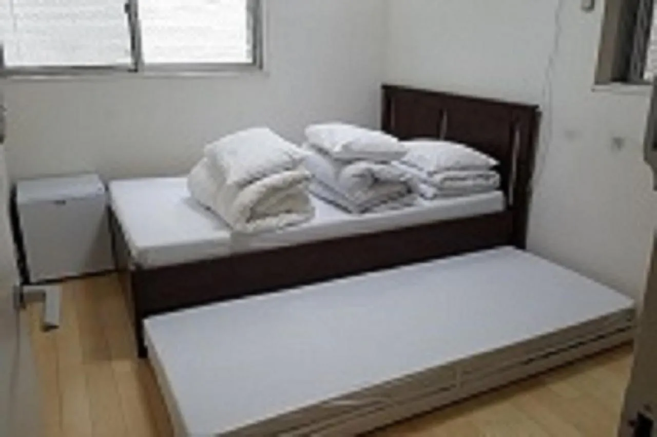 Bed in Sophiearth Apartment