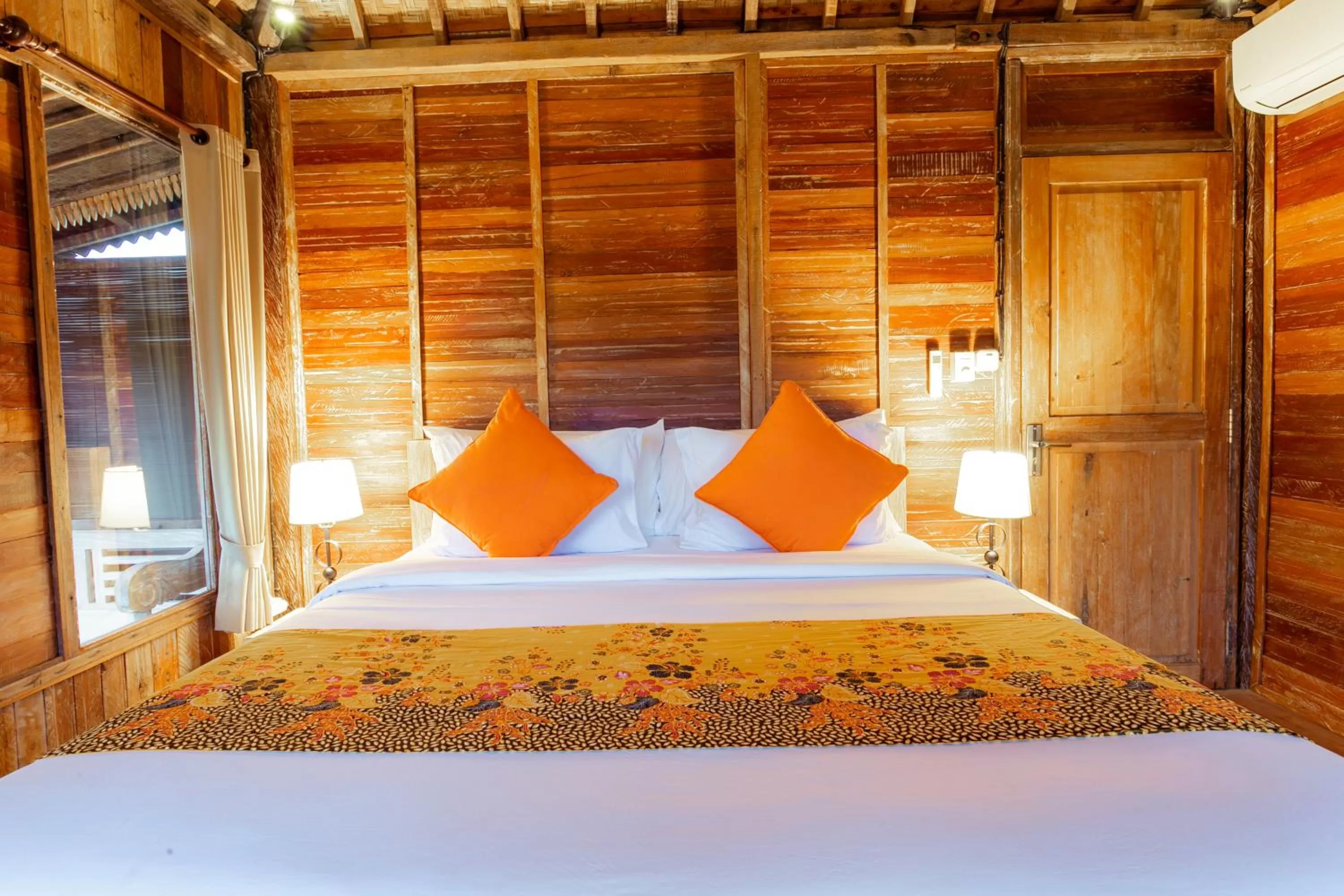 Bed in Nauna Villa Ubud