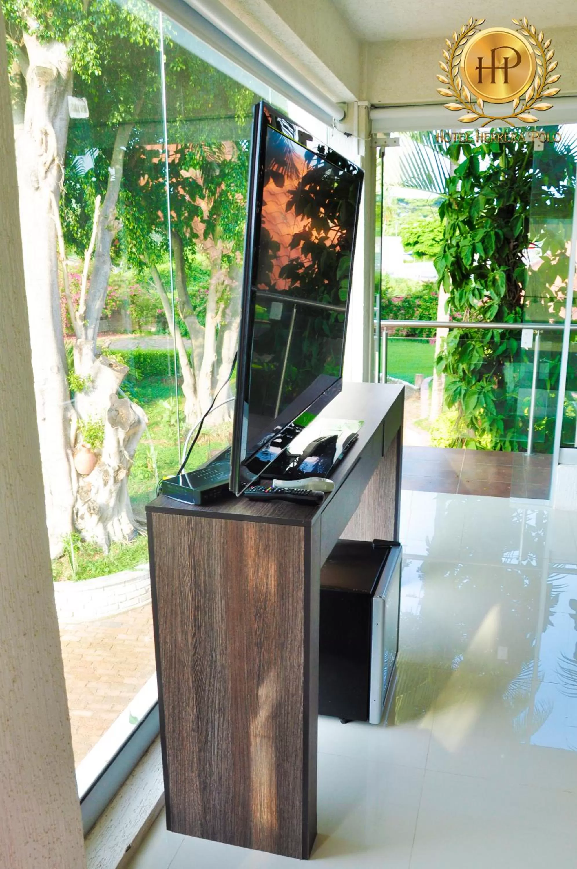 TV and multimedia, TV/Entertainment Center in Hotel Herrera Polo