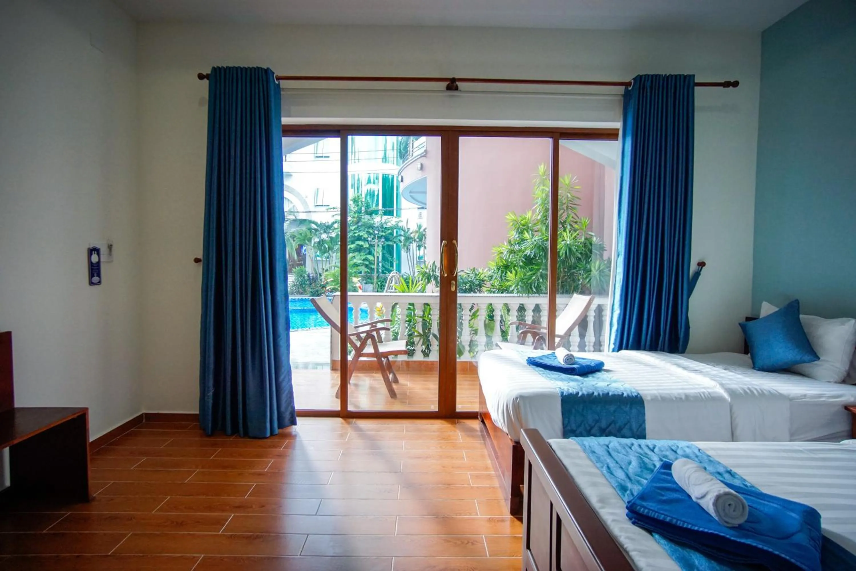 Living room, Bed in Brenta Phu Quoc Hotel