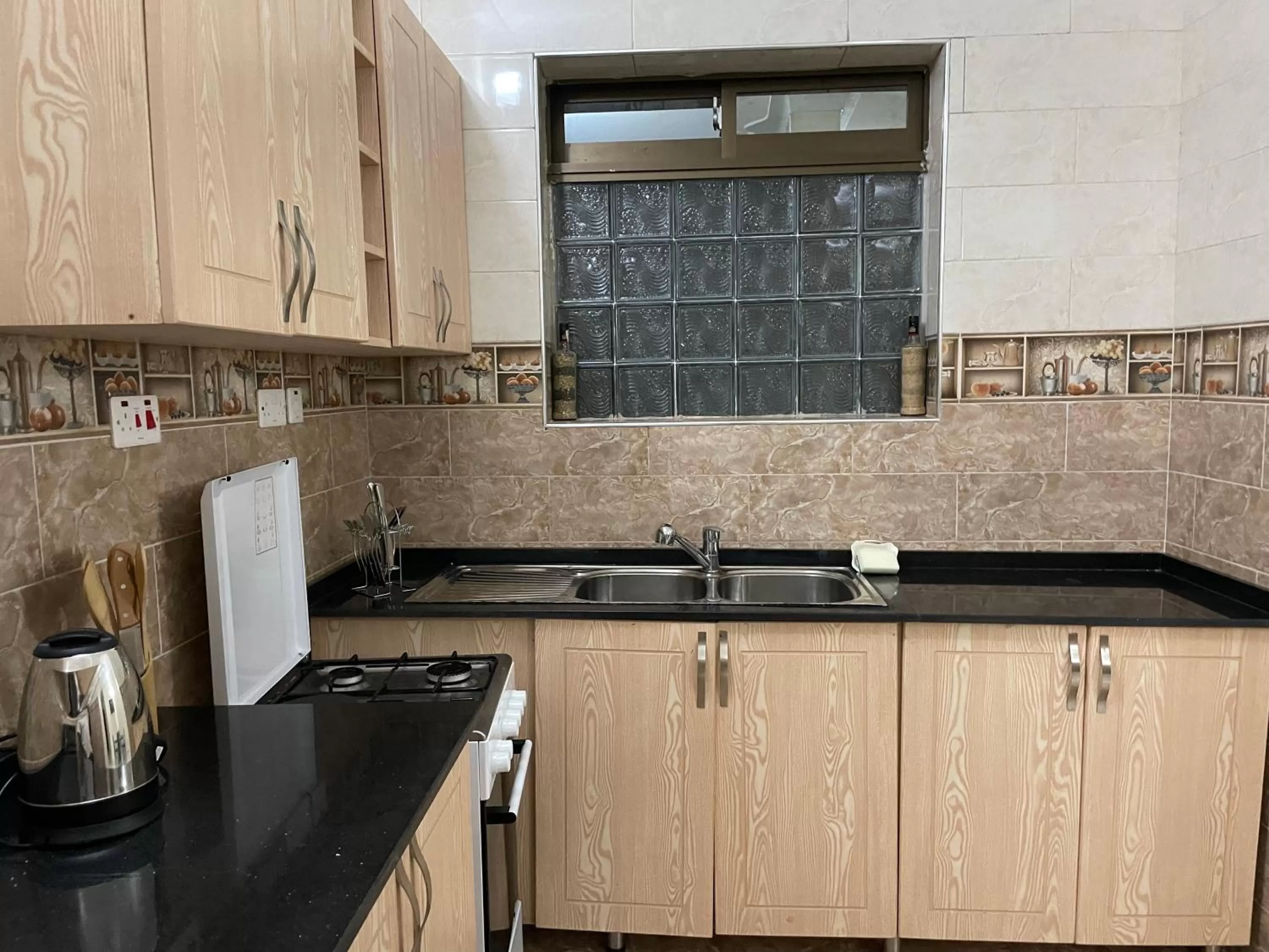 Kitchen or kitchenette in Jaffa Suites