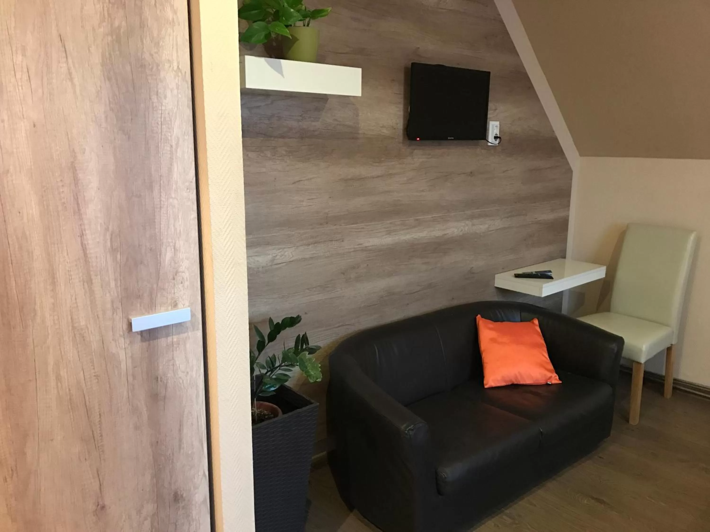 Seating area in Abszolút Hotel és Panzió