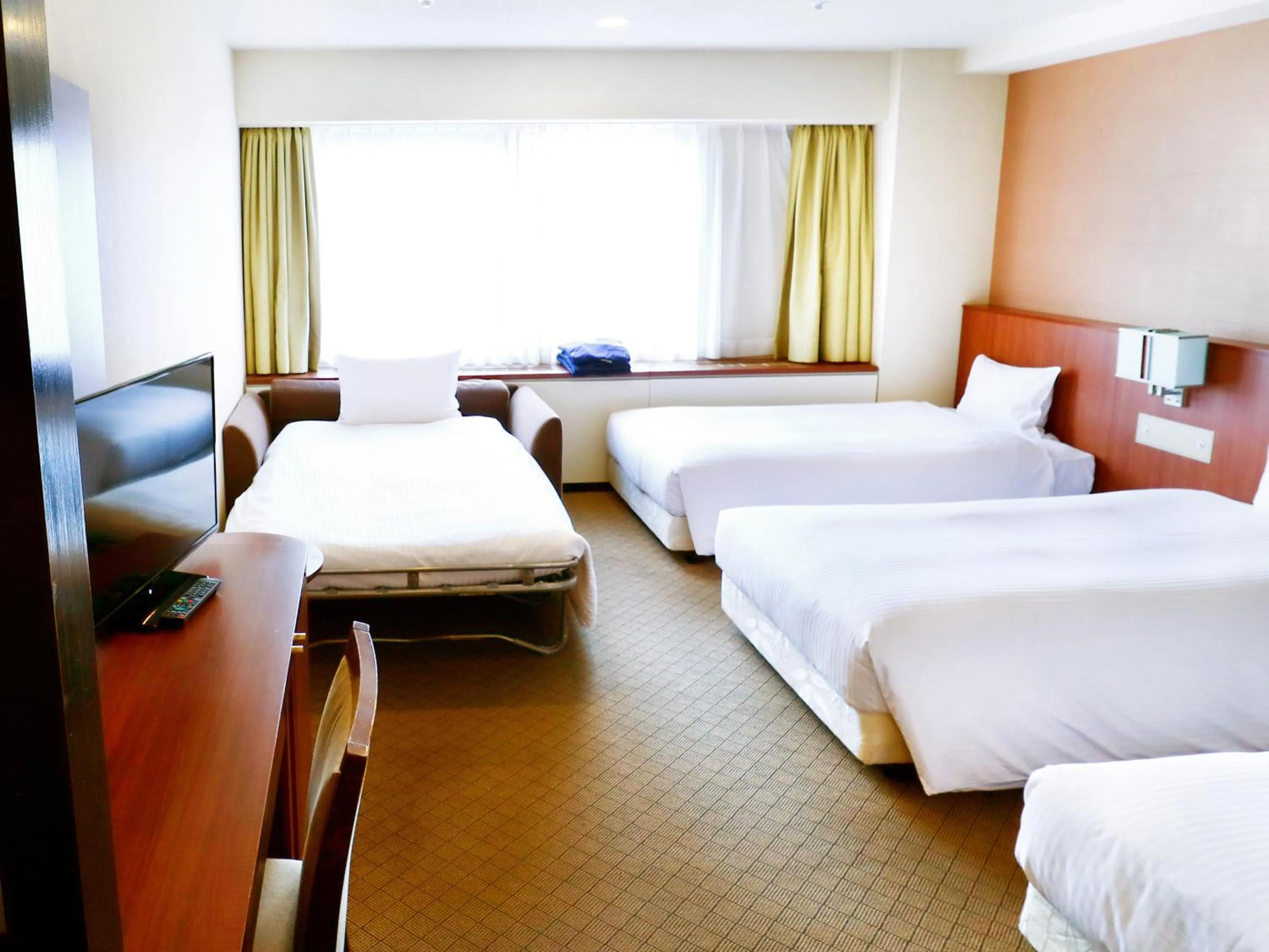 Bed in Hotel Abest Sapporo