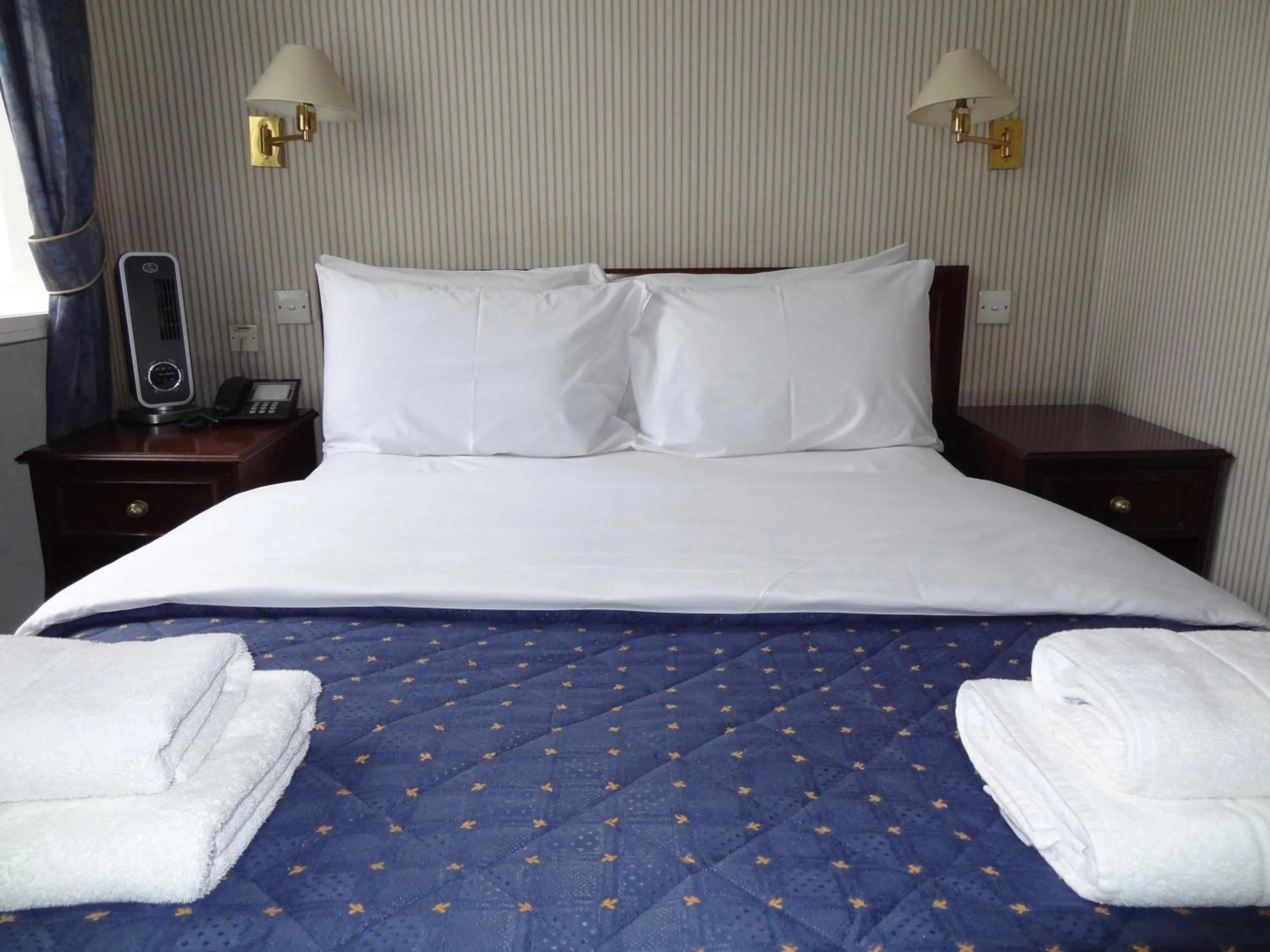 Bed in Regency House Hotel
