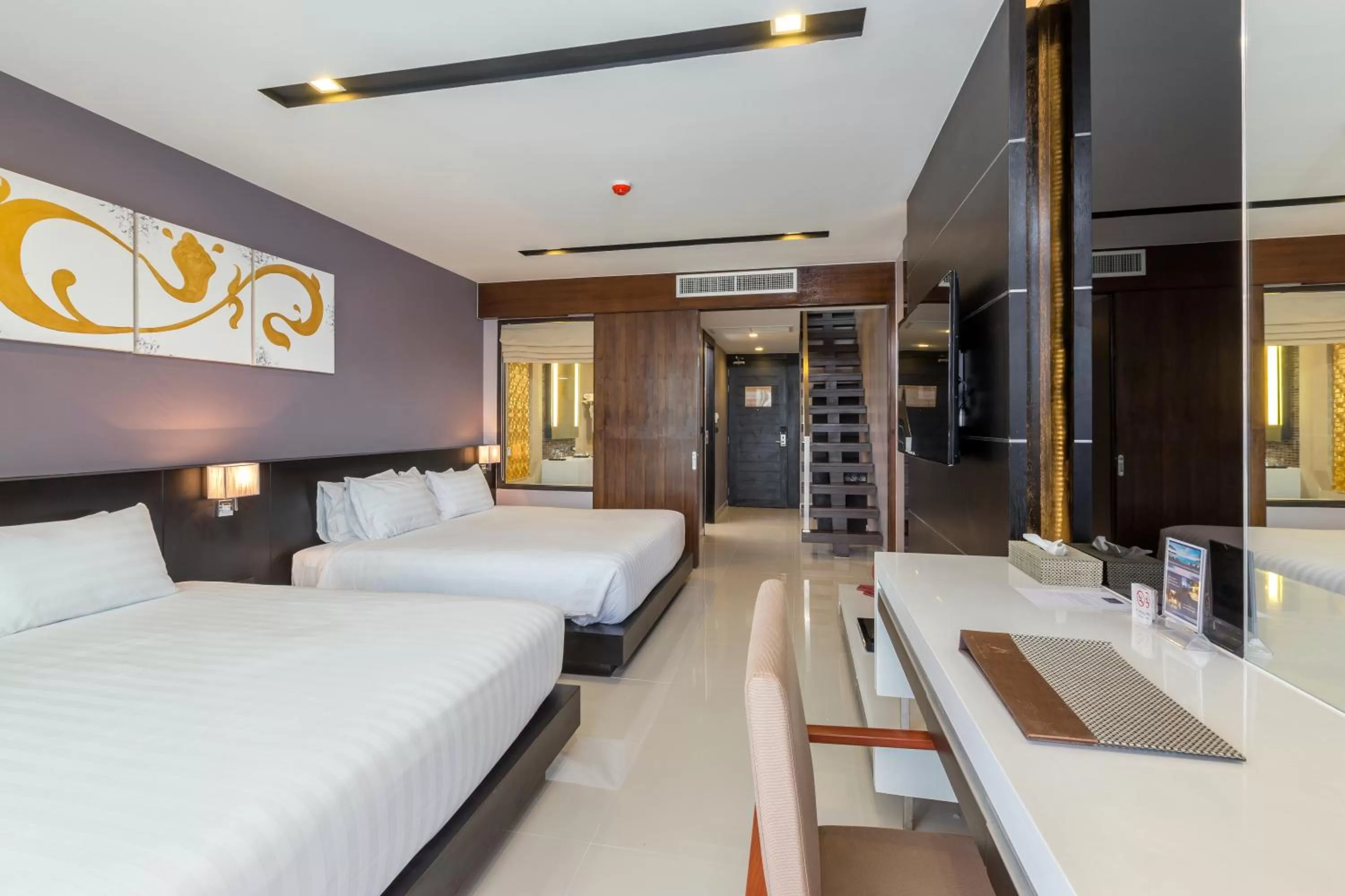 Photo of the whole room, Bed in The Charm Resort Phuket - SHA Certified