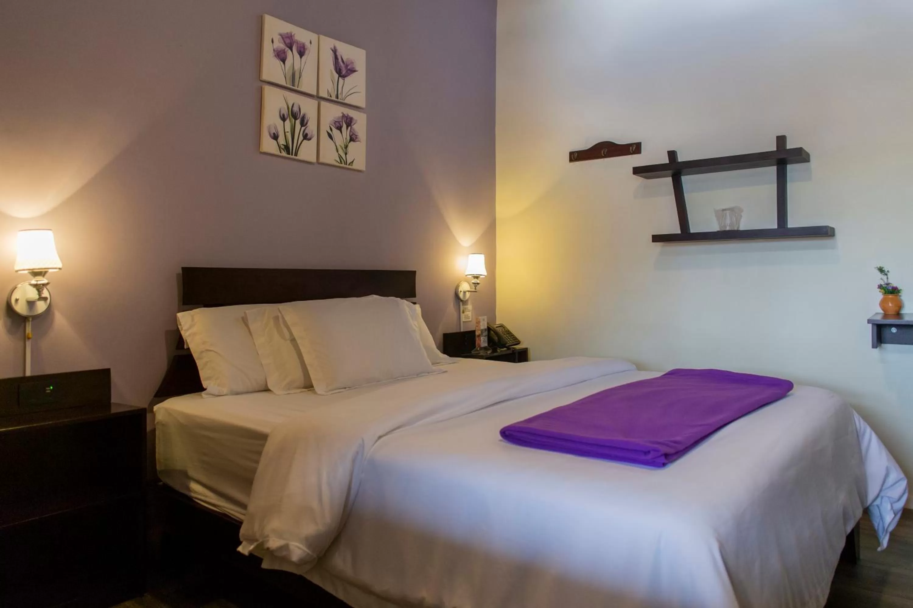 Bed in Hotel Colonial San Agustin