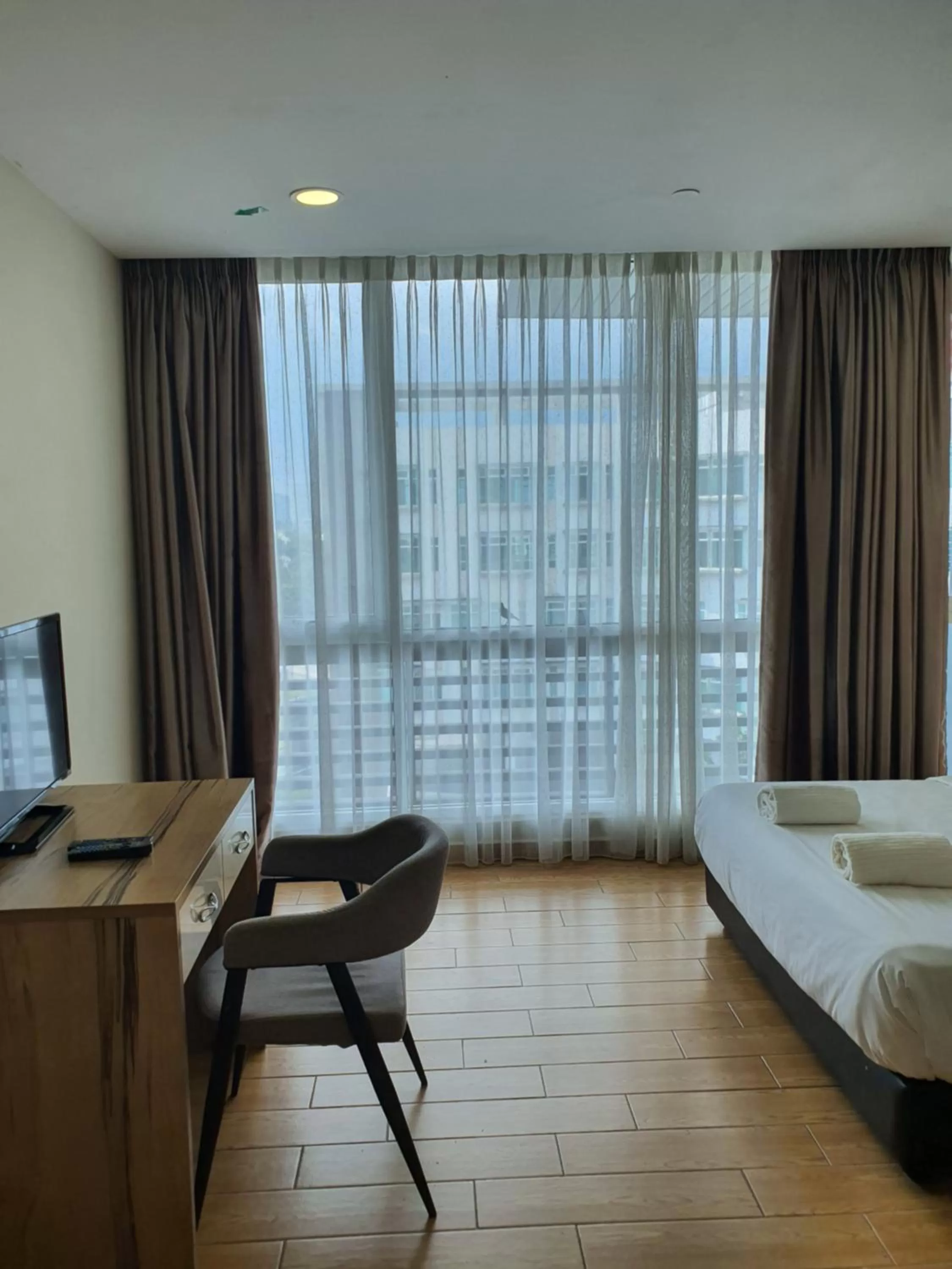 Seating area, Bed in Bangi Perdana Hotel