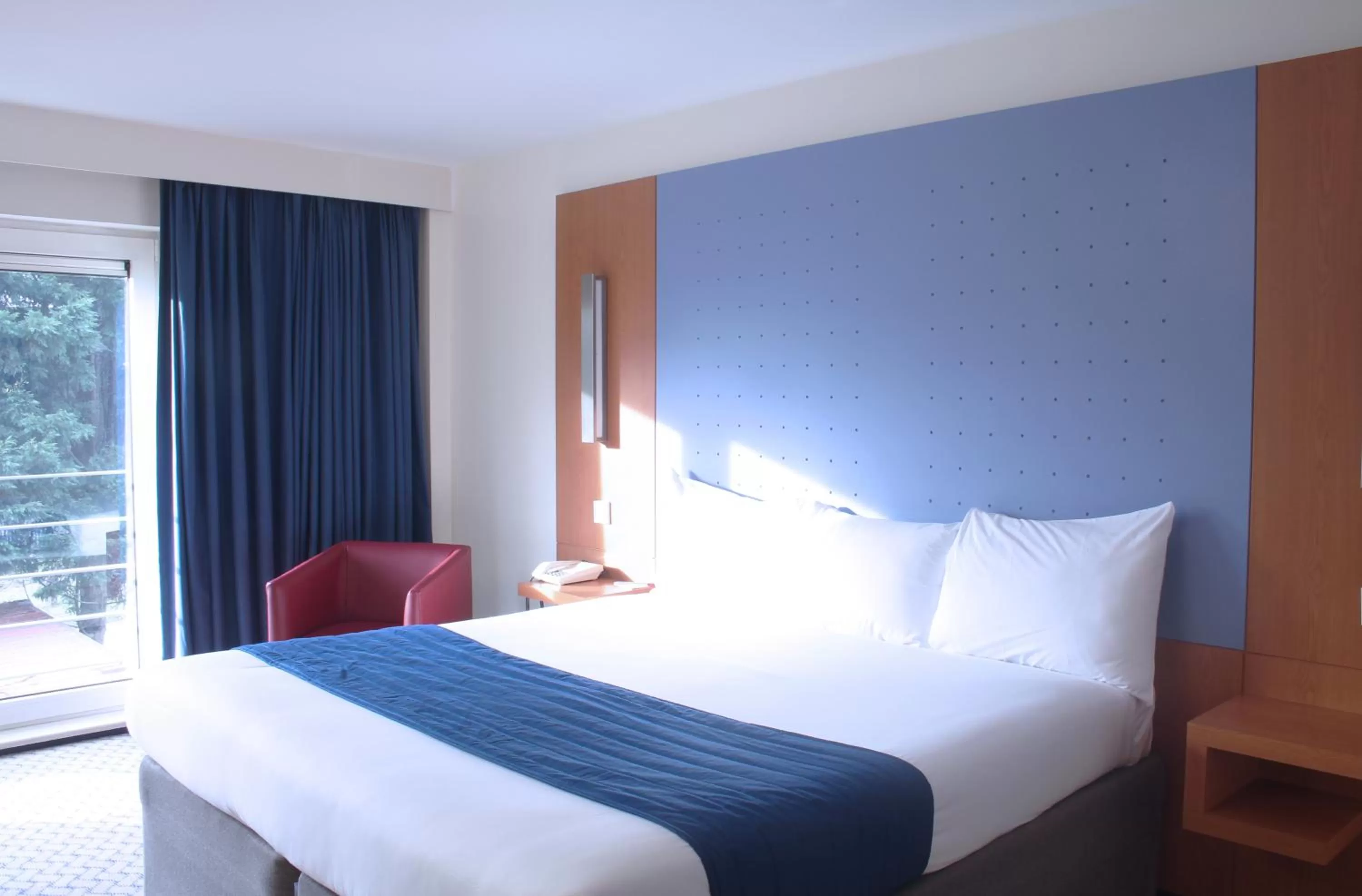 Family Room with One Double and Two Single Pullout Beds in Ramada London North