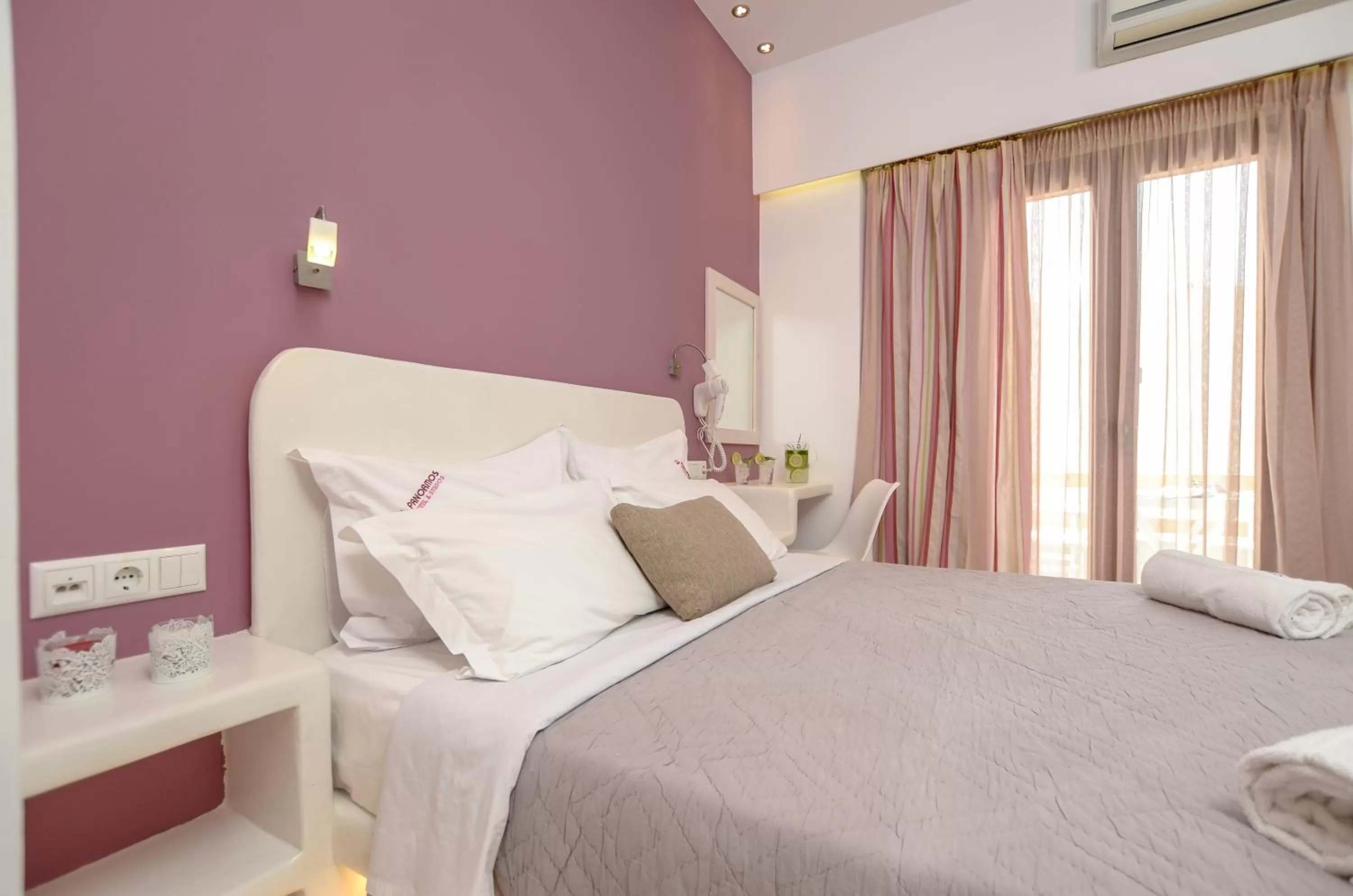 Bed in Panormos Hotel and Studios