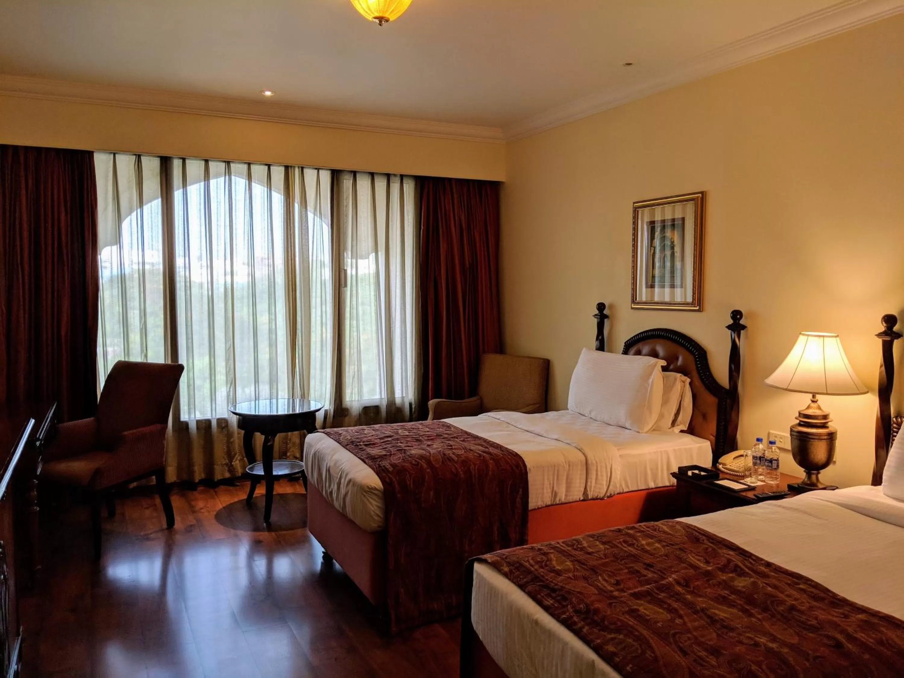 Photo of the whole room, Bed in Taj Krishna