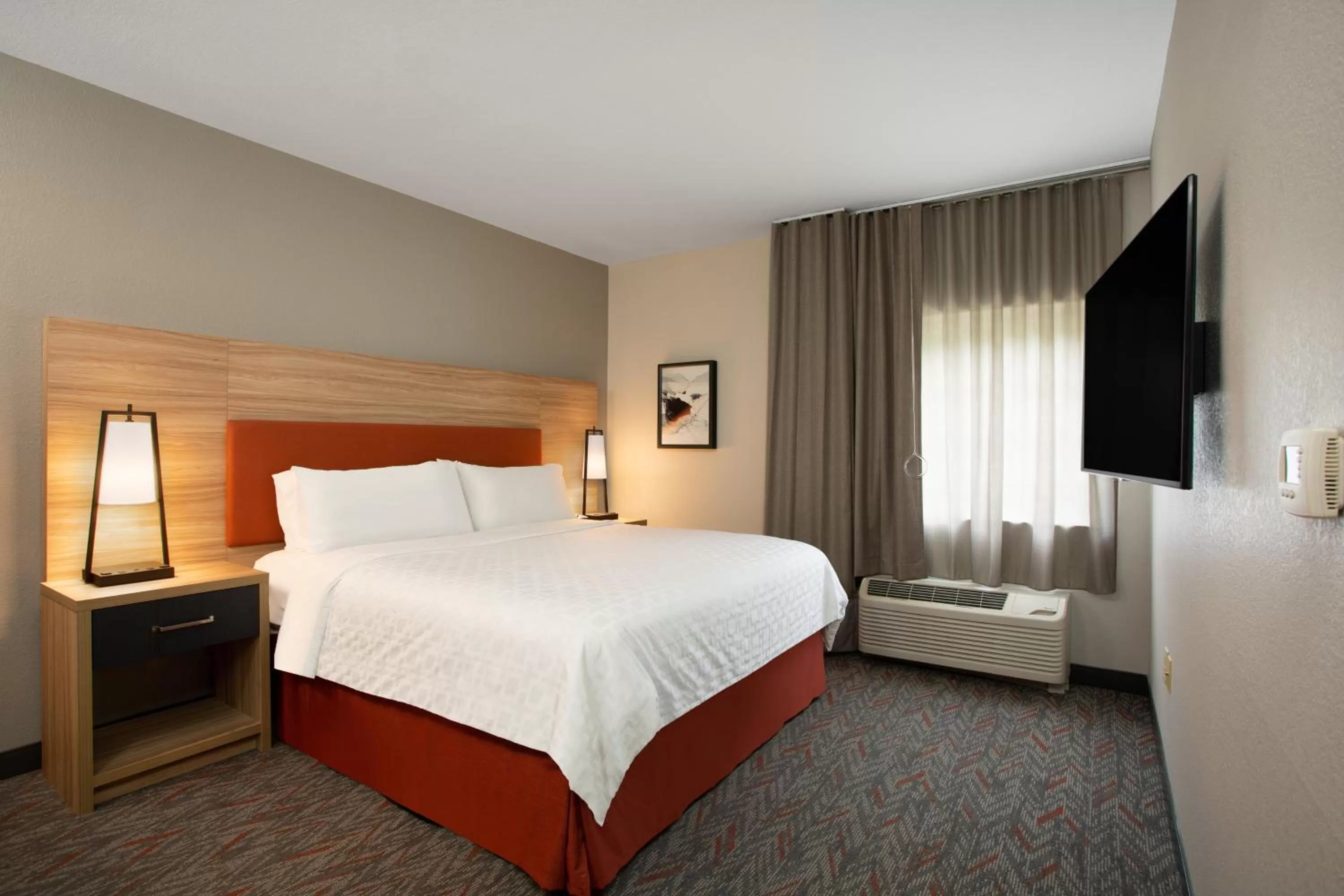 Photo of the whole room, Bed in Candlewood Suites Apex Raleigh Area by IHG