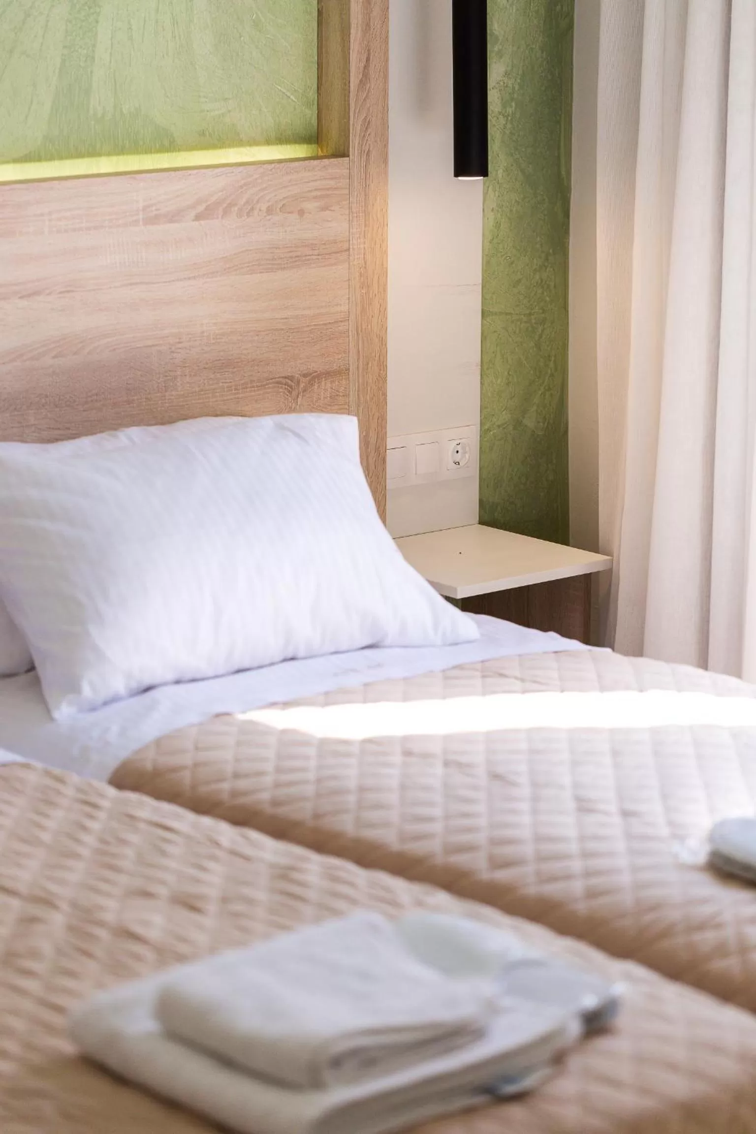 Bed in Ark 68 City Rooms