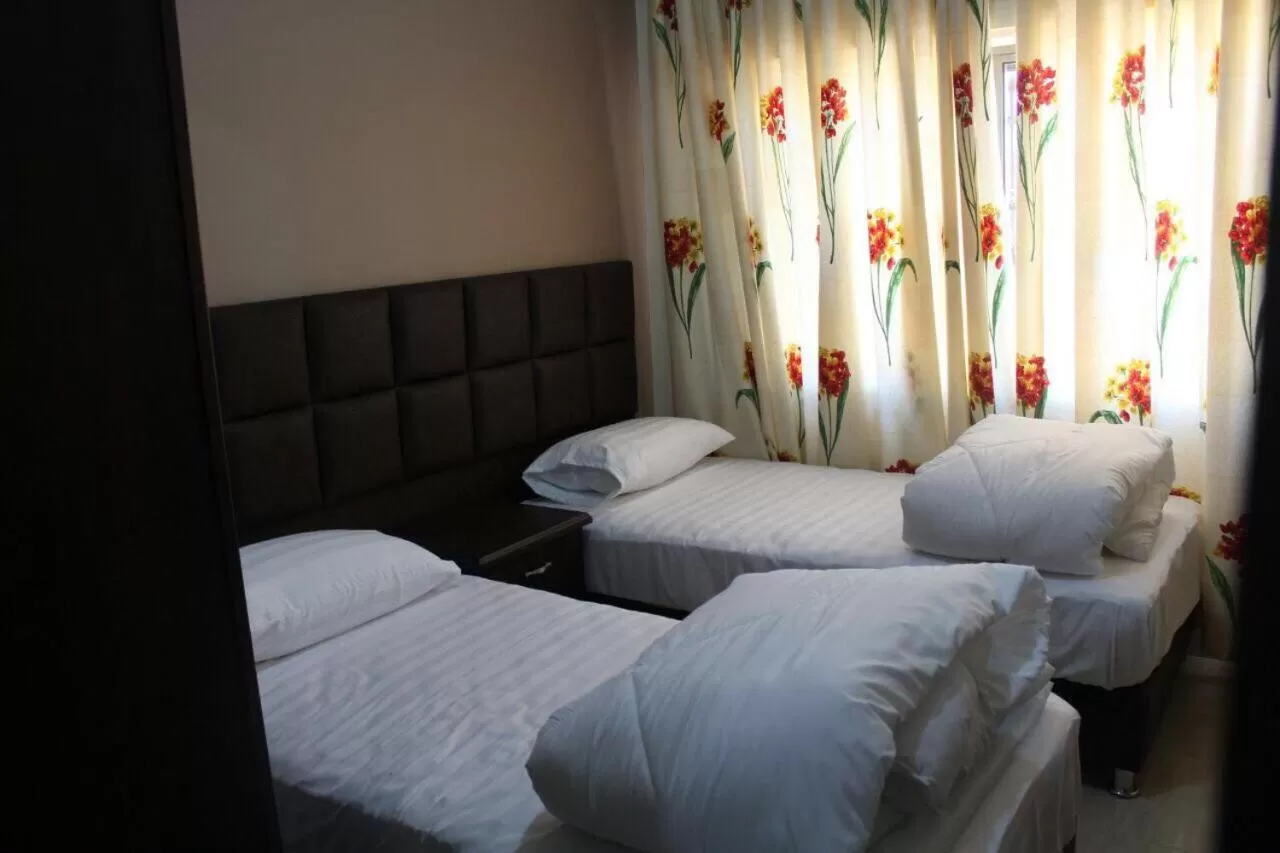 Bed in Al haramain Furnished Apartments