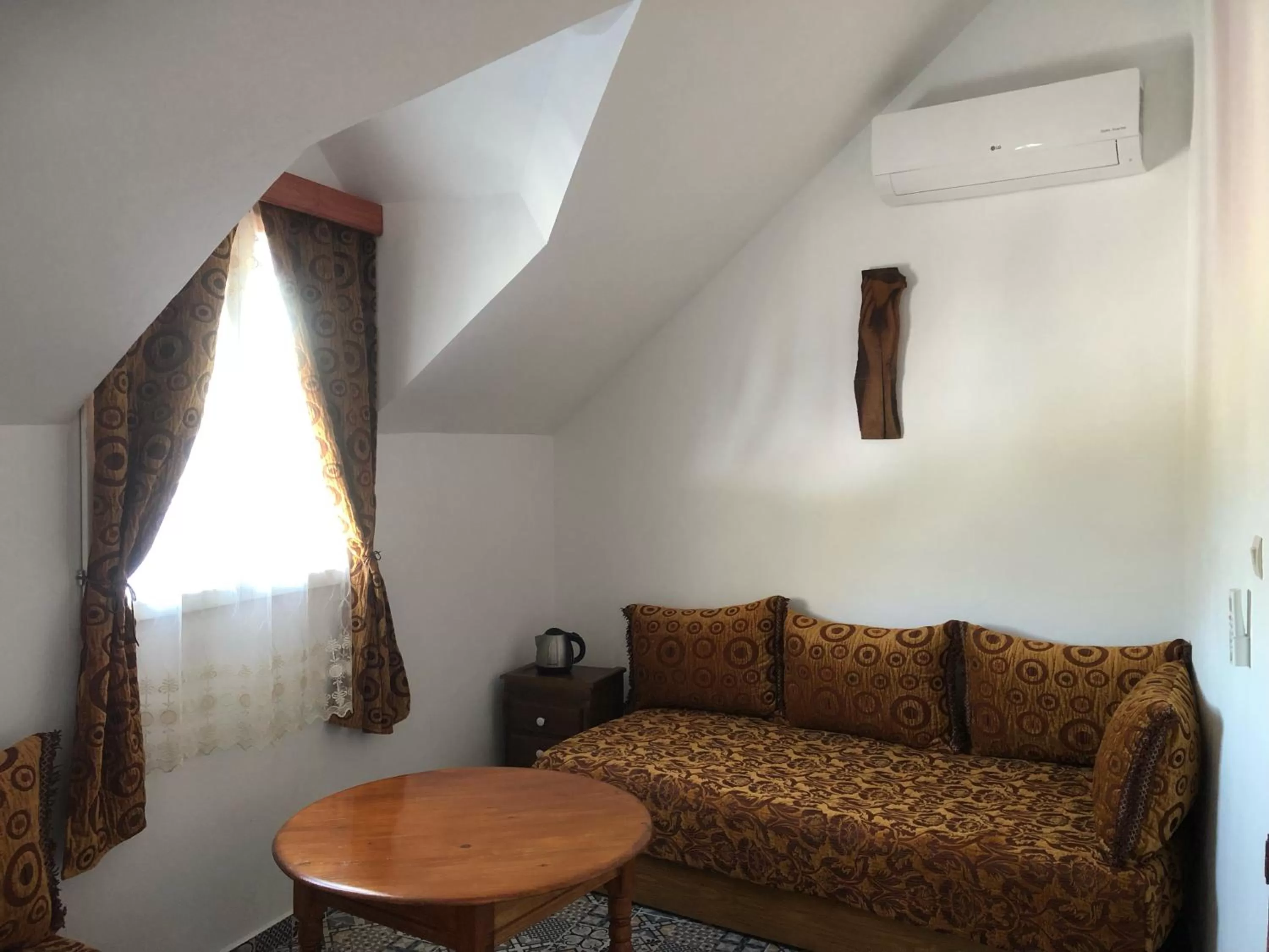 Bed, Seating Area in Dar Fatima