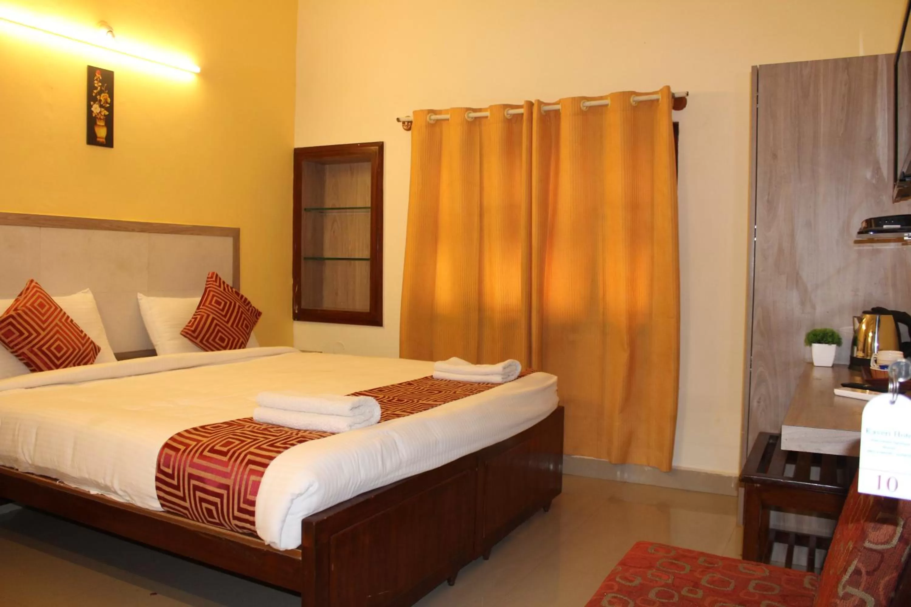 Bed in Hotel Kaveri