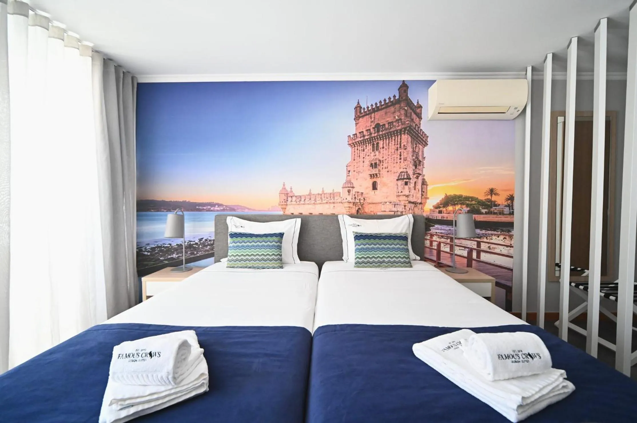 Bed in Famous Crows Lisbon Suites