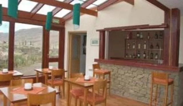 Lounge or bar in Hosteria Roblesur