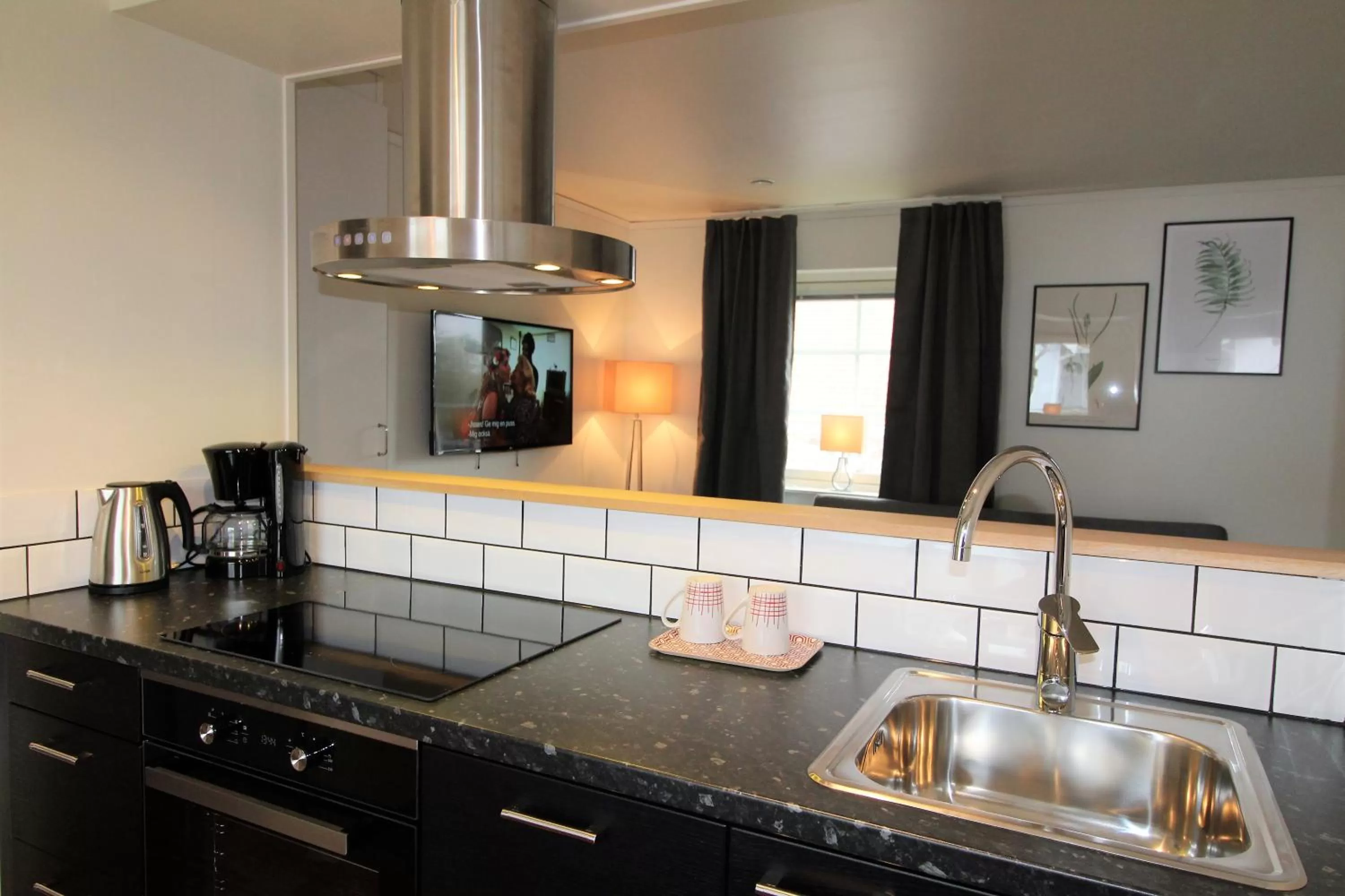 Kitchen or kitchenette in Easy Livin' Apartment Hotel
