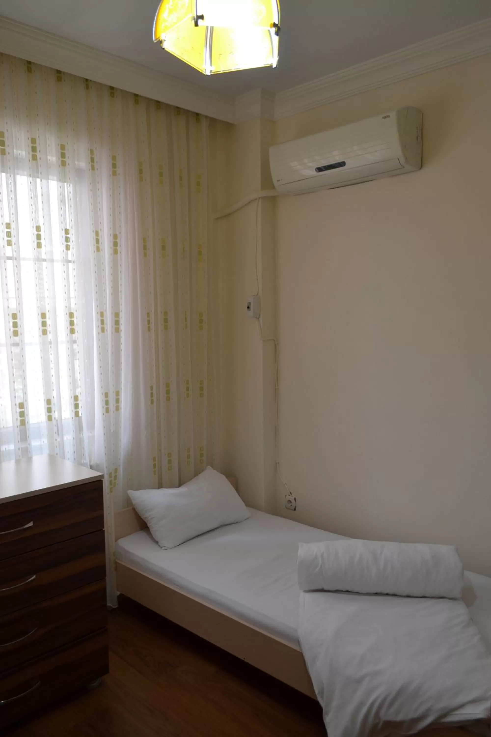 Bed in The Twins Apartmens