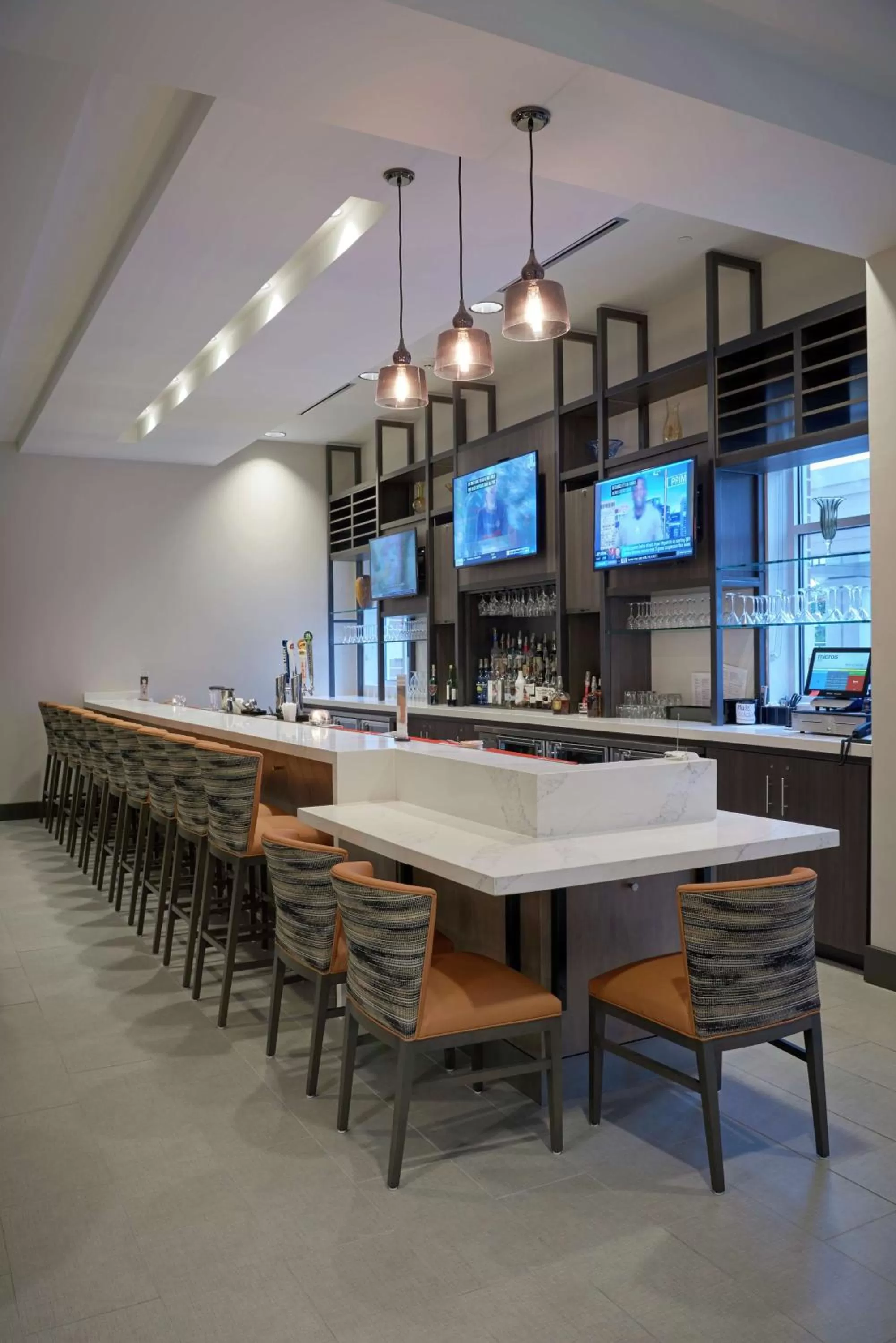 Lounge or bar in Hilton Garden Inn Corning Downtown