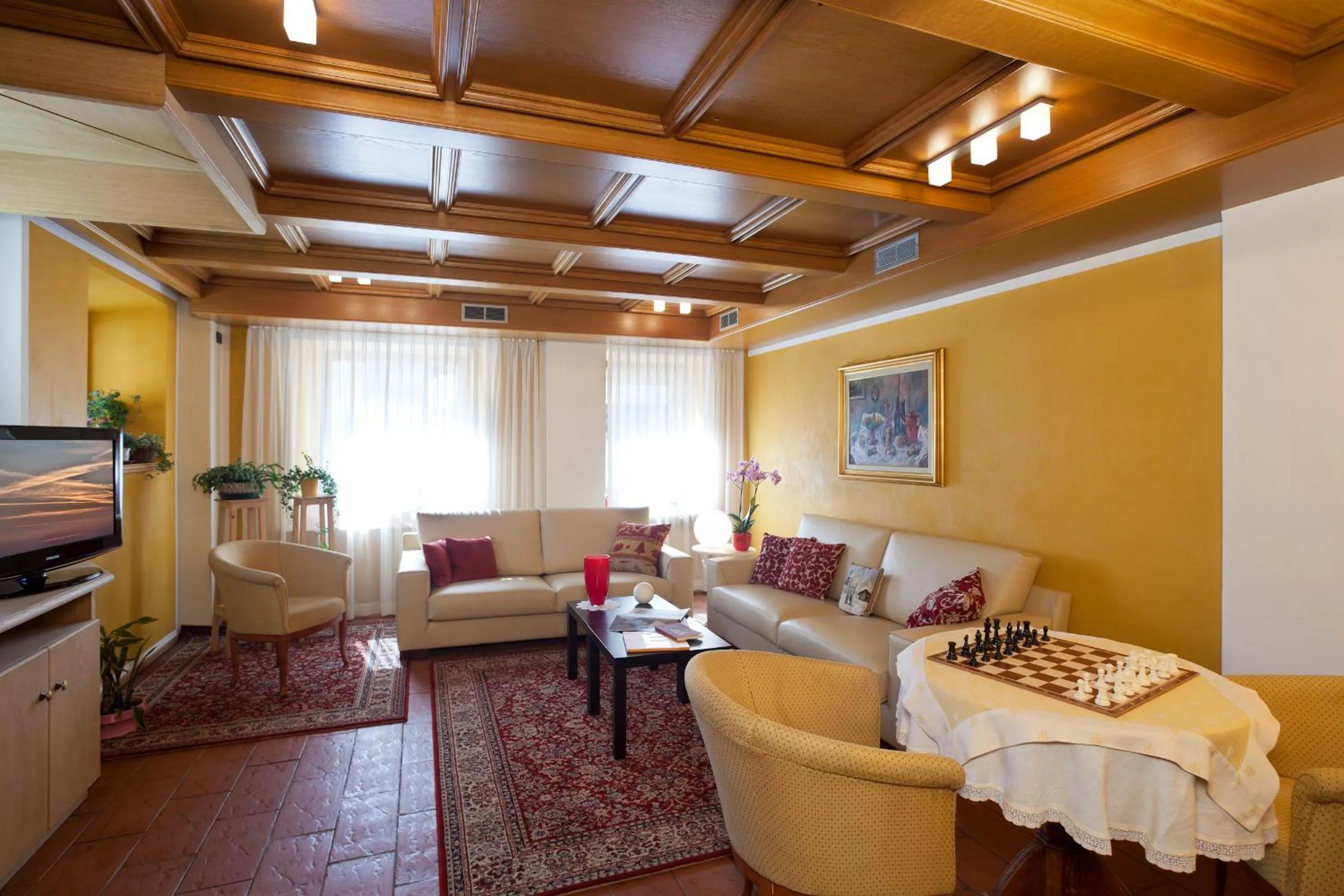 Communal lounge/ TV room in Hotel Livigno