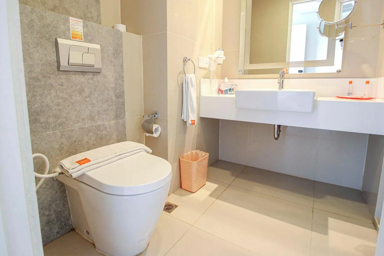 Bathroom in HARRIS Hotel Pontianak