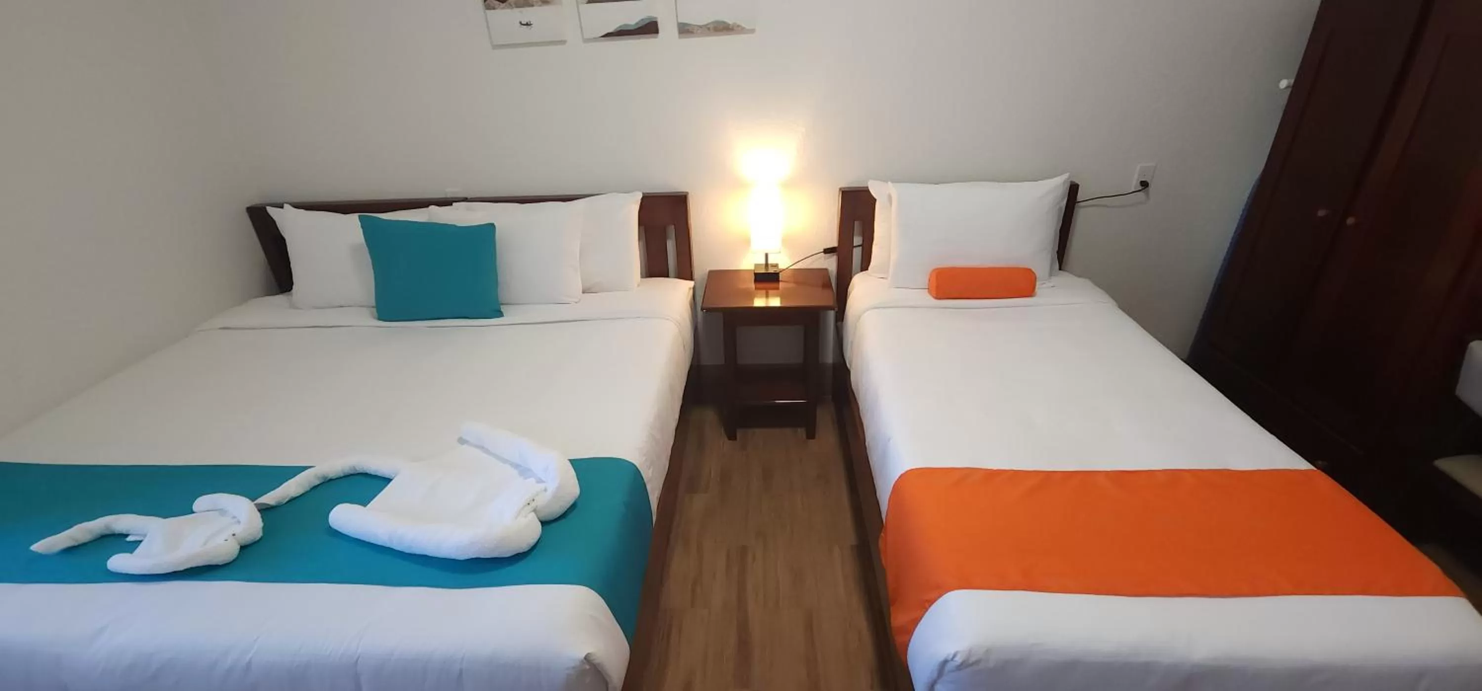 Bed in Voyager Sun & Reef Hotel