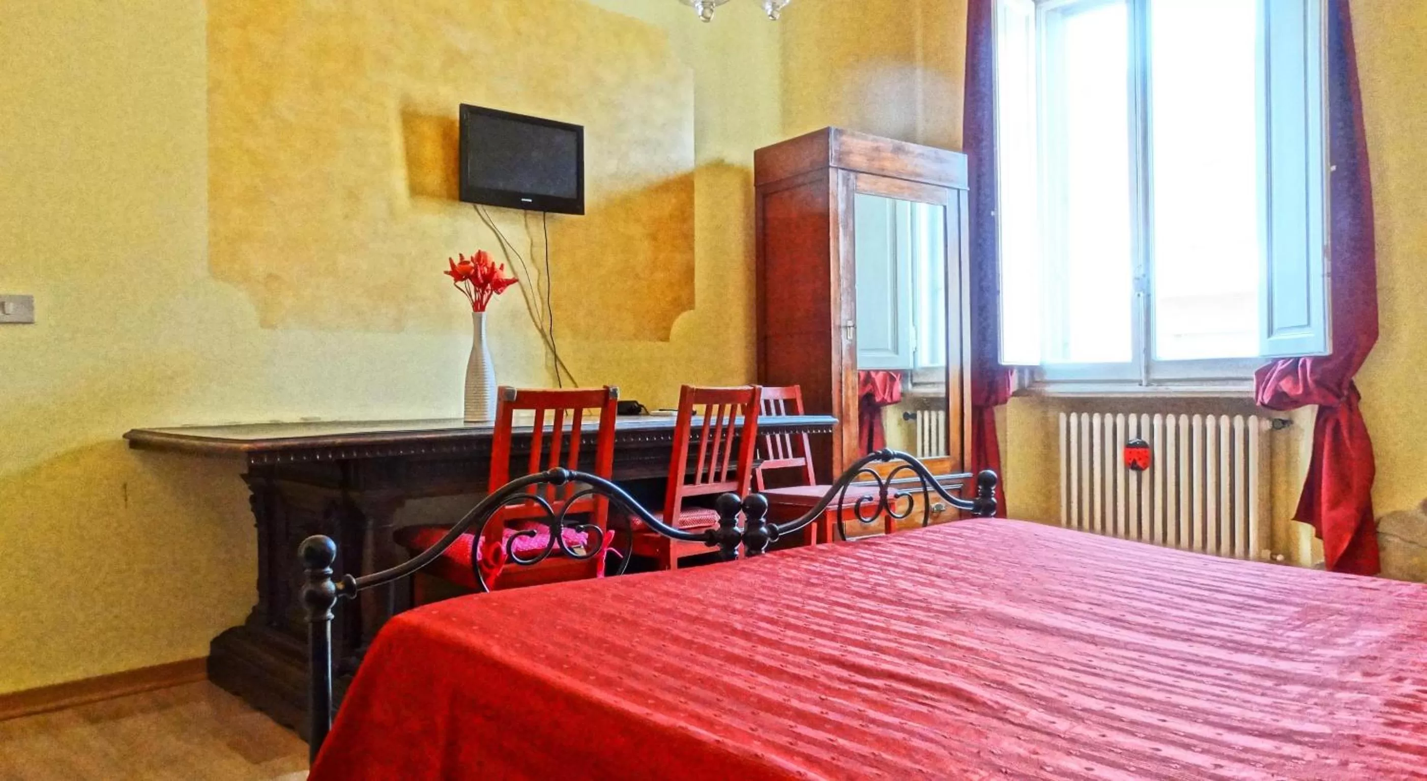 Photo of the whole room in Affittacamere Belfiore