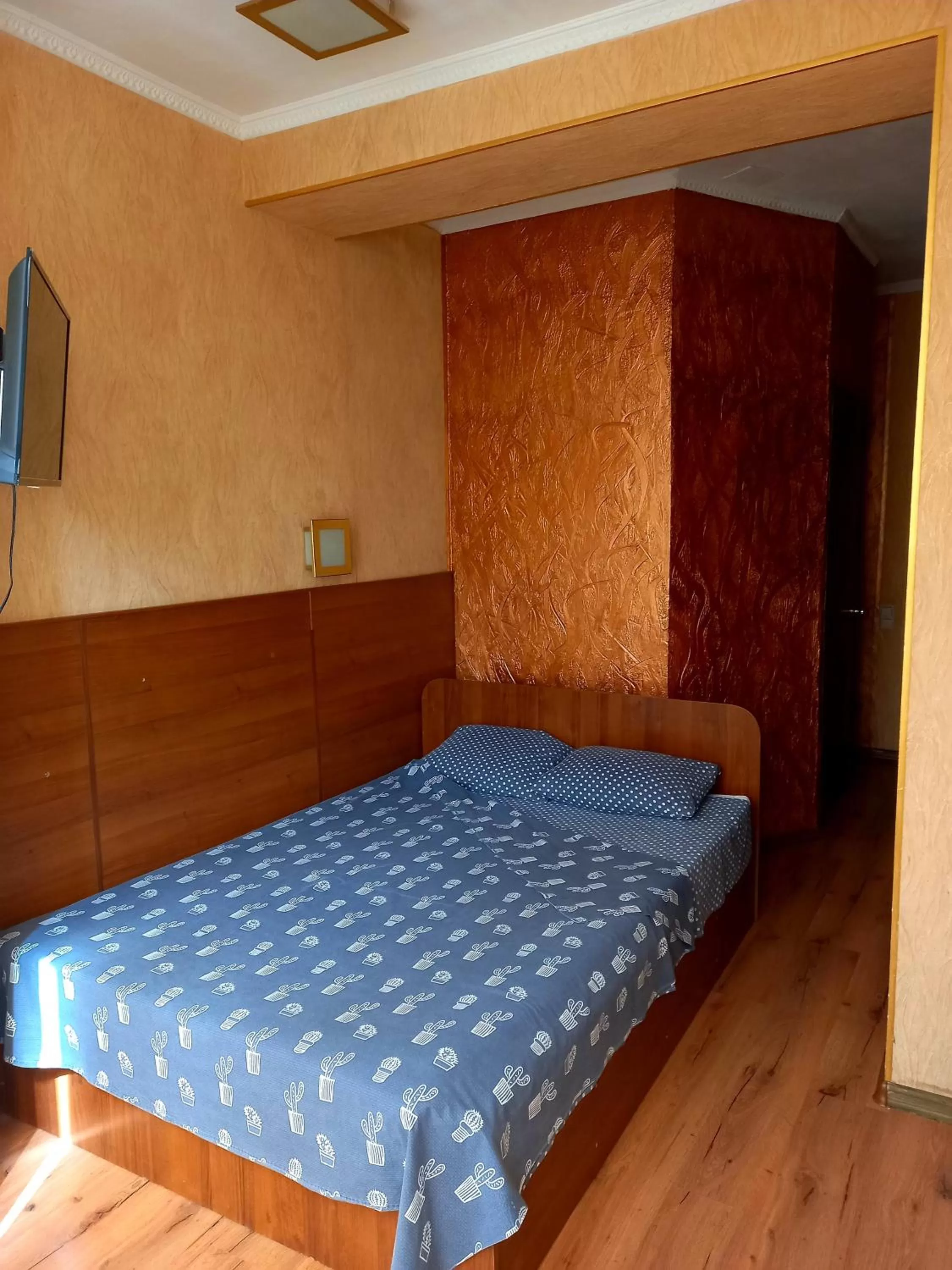 Bed in Rodina Hotel