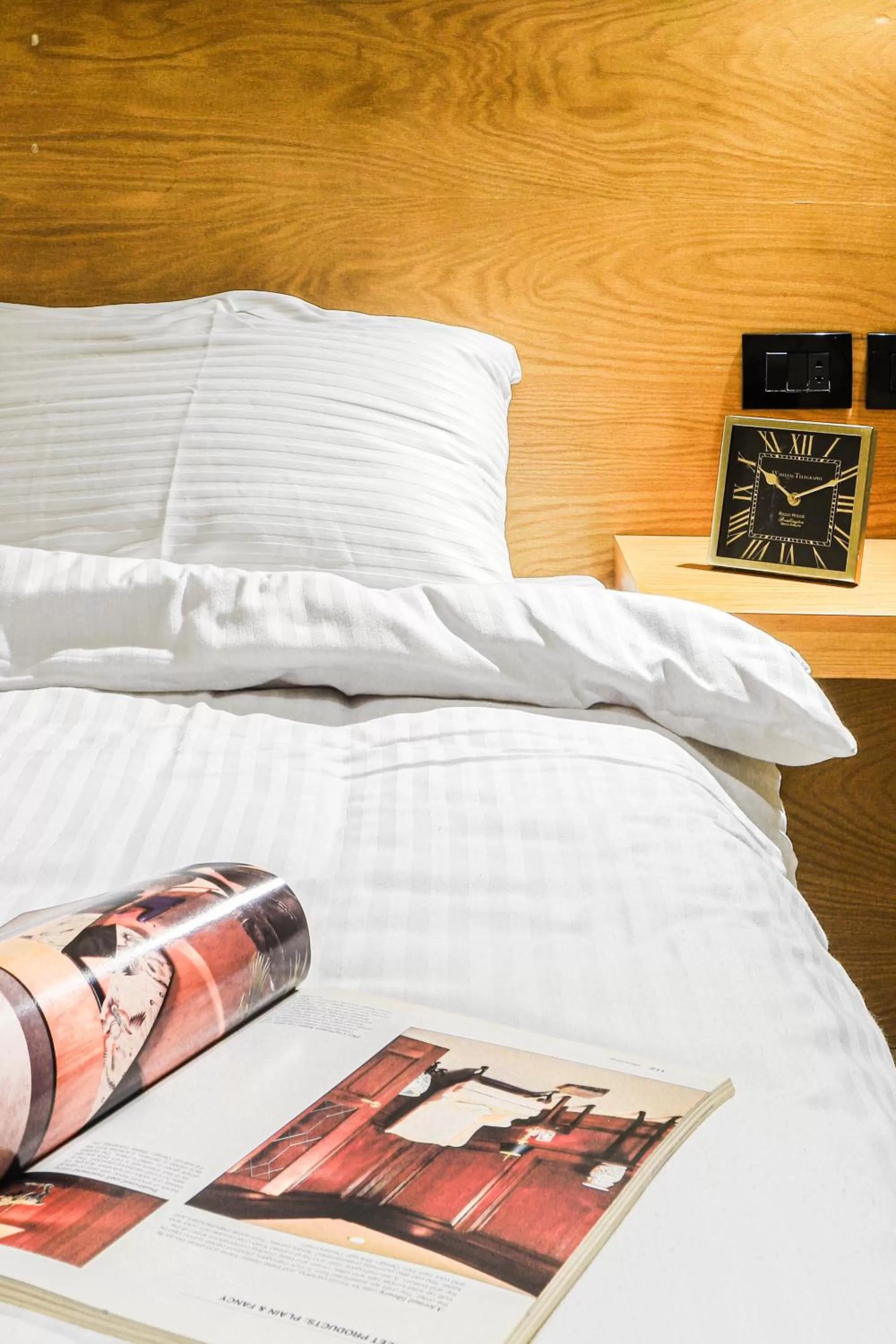 Bed in NewCity Hotel & Suites