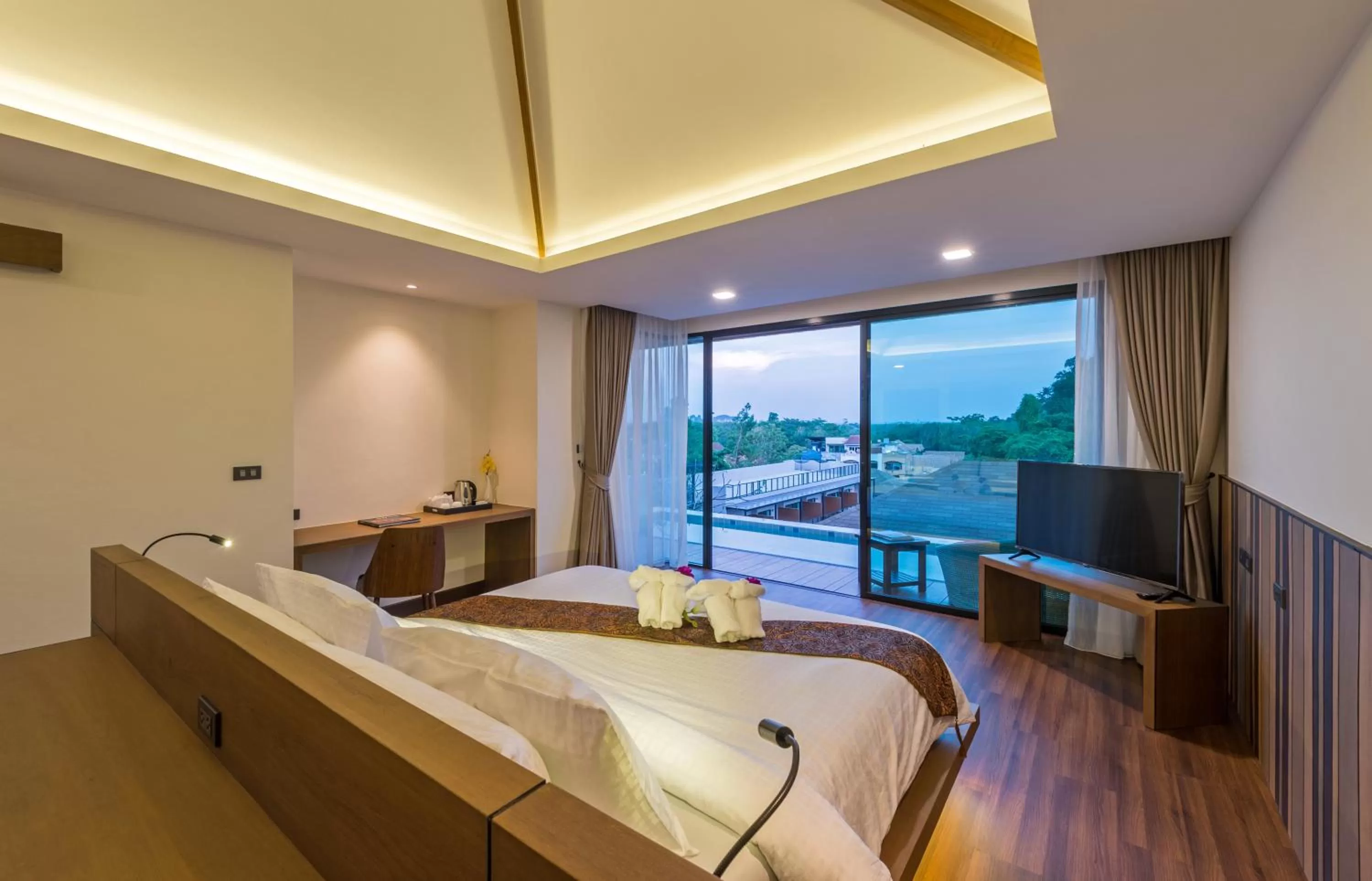 Communal lounge/ TV room, Bed in Cher​mantra​ Aonang​ Resort & Pool​ Suite