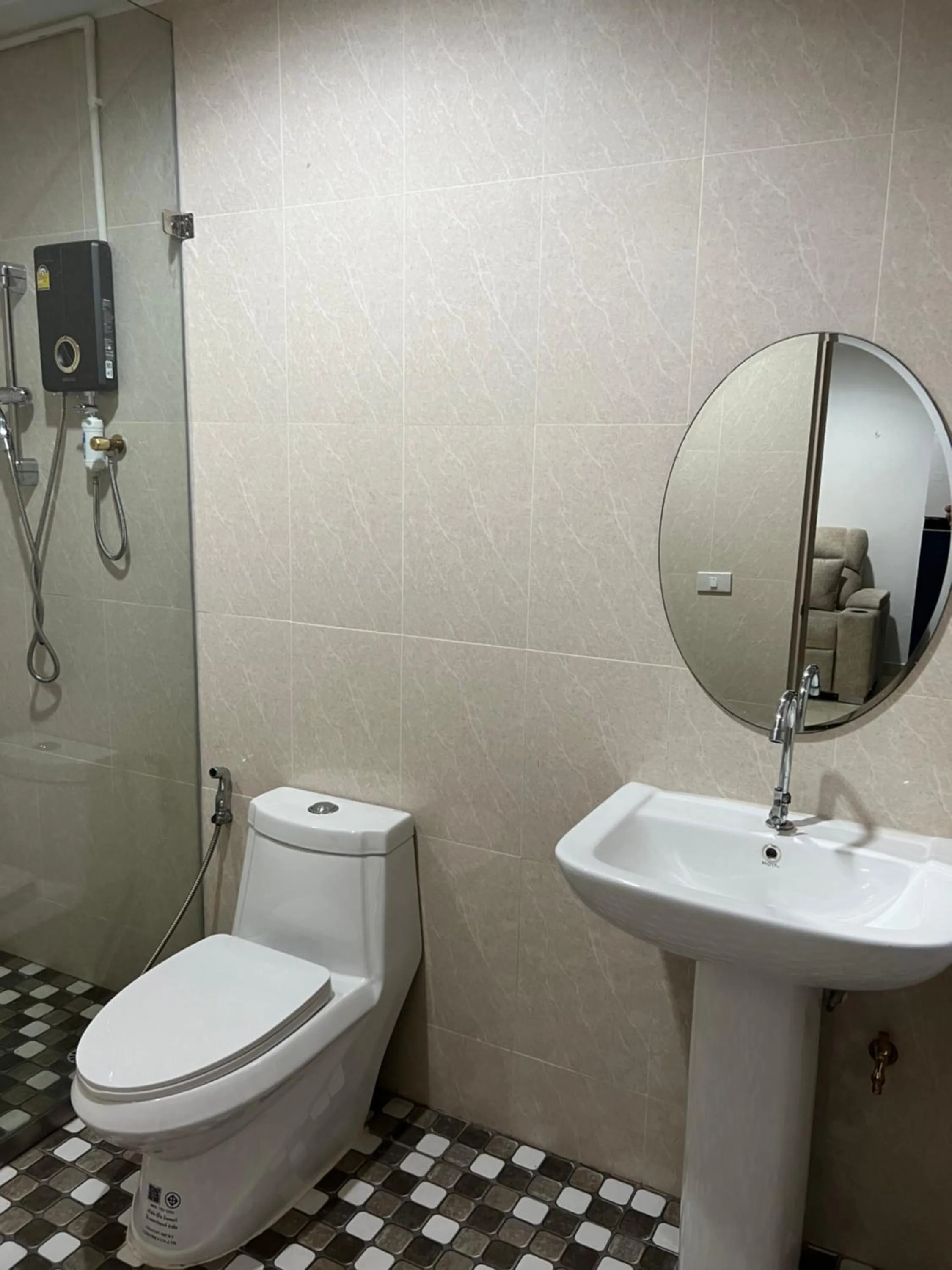 Toilet in Mall Suites Hotel