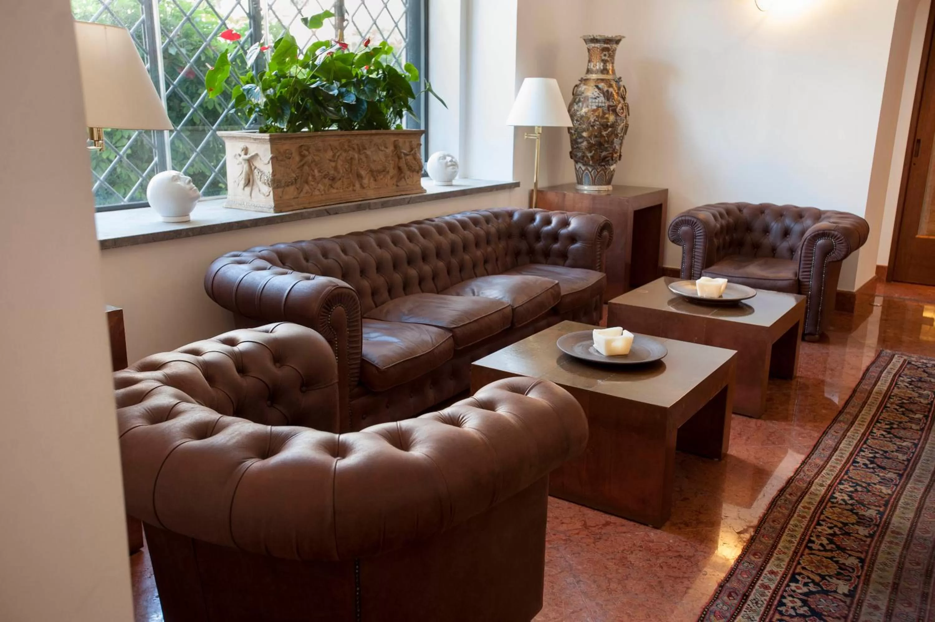 Communal lounge/ TV room in Palazzo Brunaccini Boutique Hotel