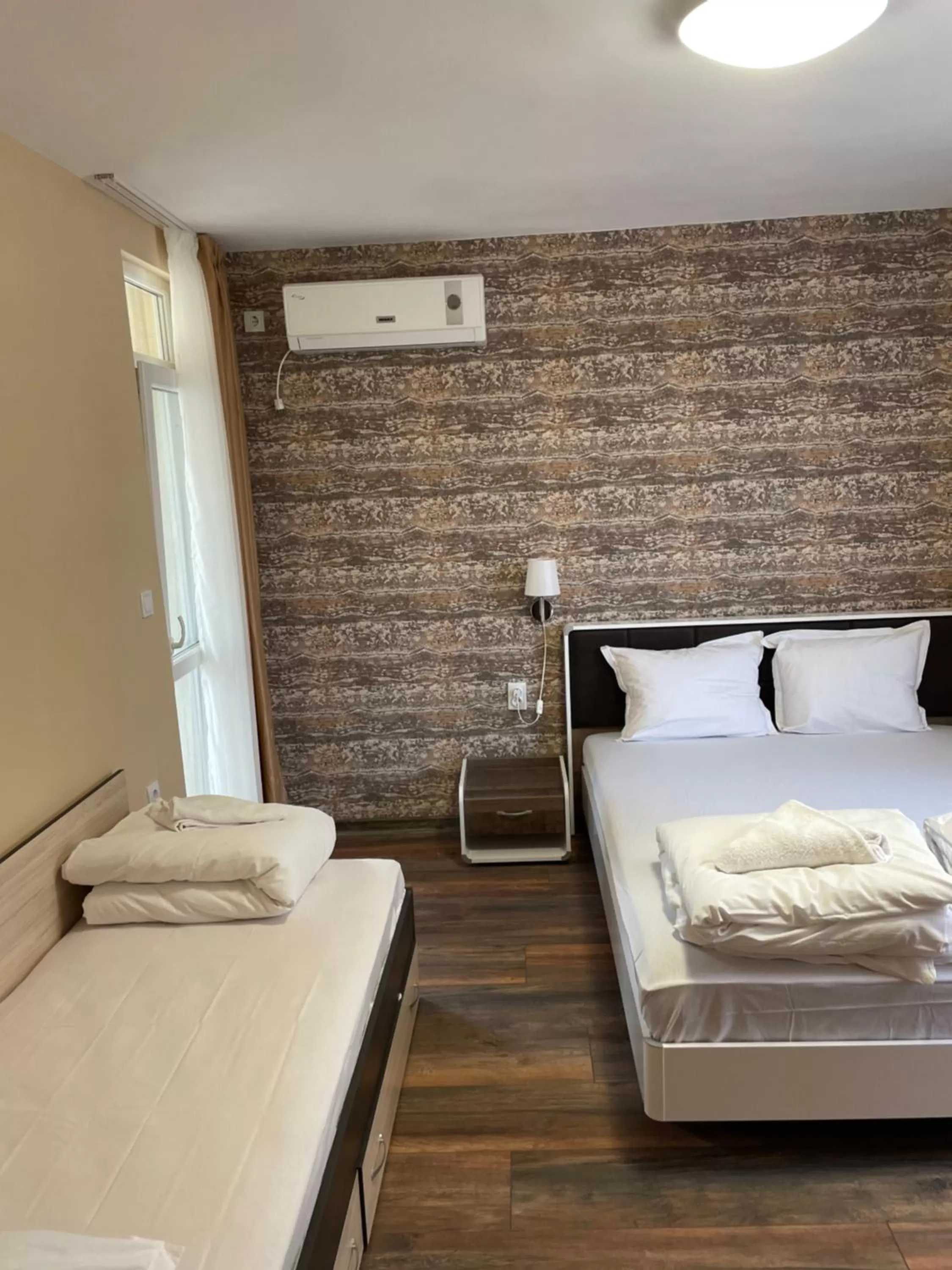 Bed in Family Hotel Malibu