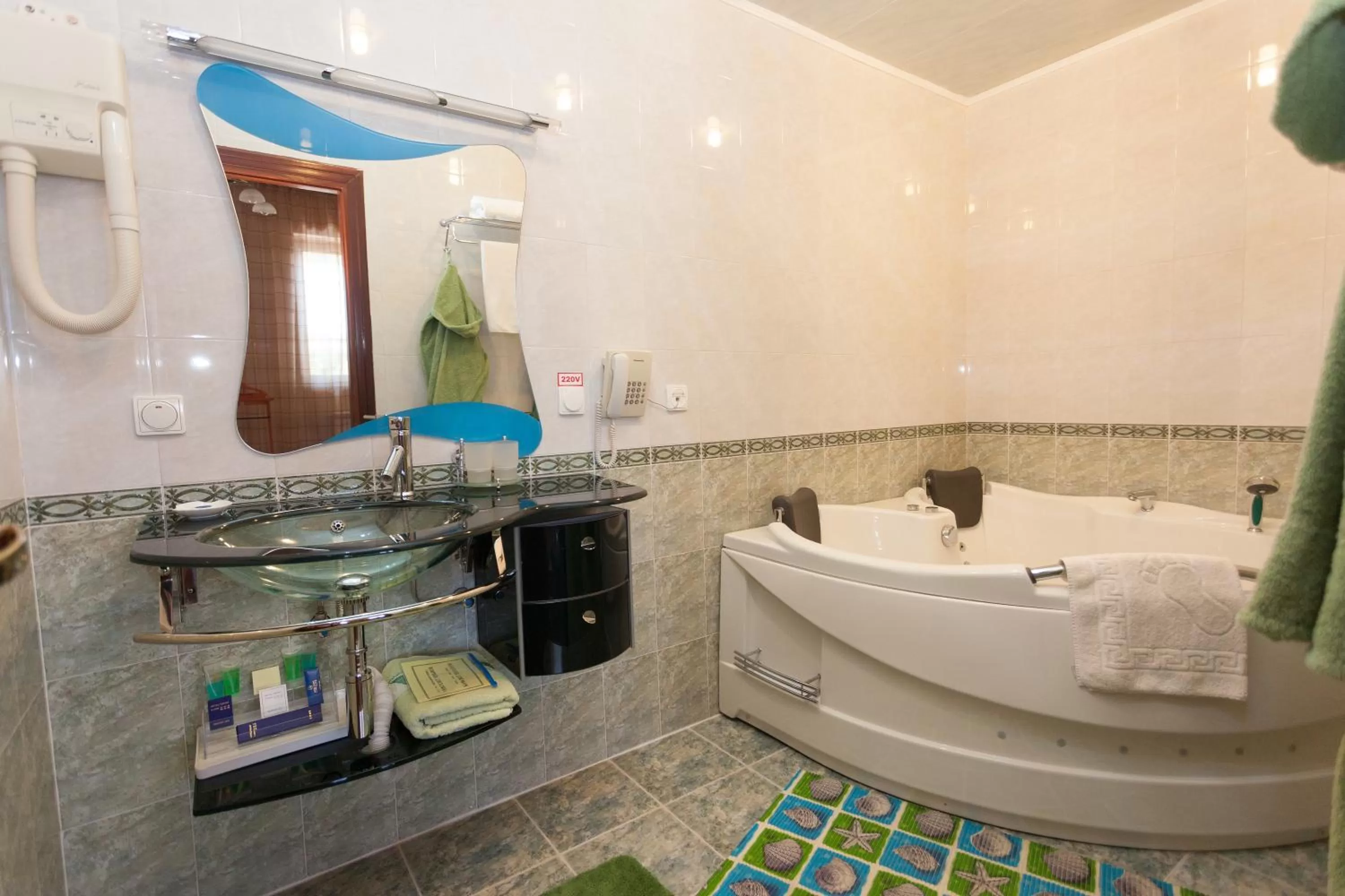 Bathroom in Rahat Hotel