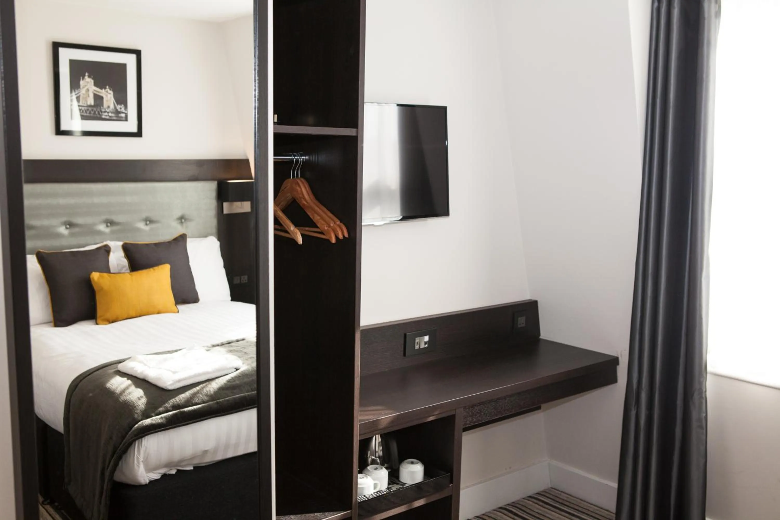 Bed in The Tudor Inn Hotel