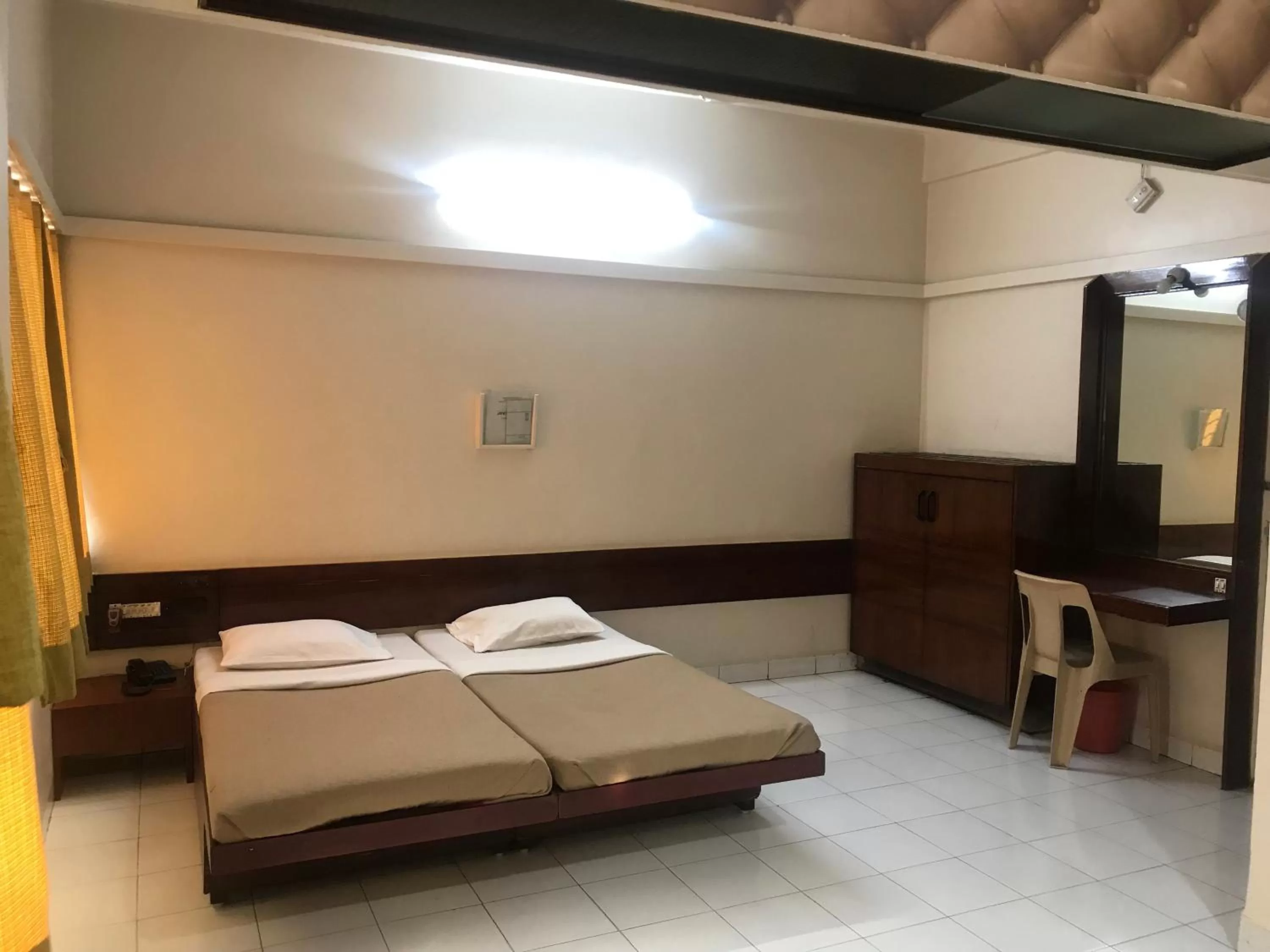 Photo of the whole room, Bed in Maurya Residency