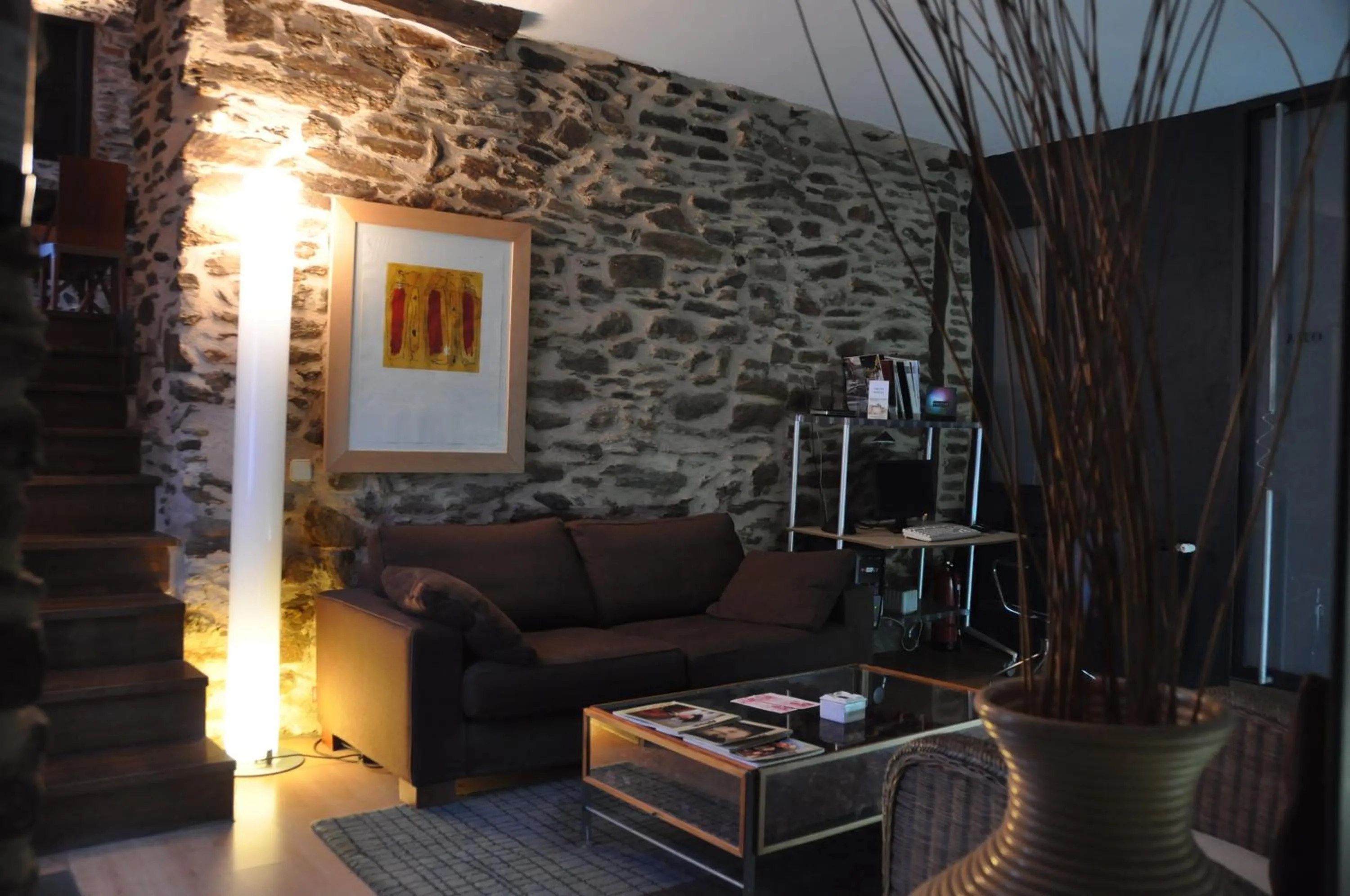 Communal lounge/ TV room in Posada Real La Carteria