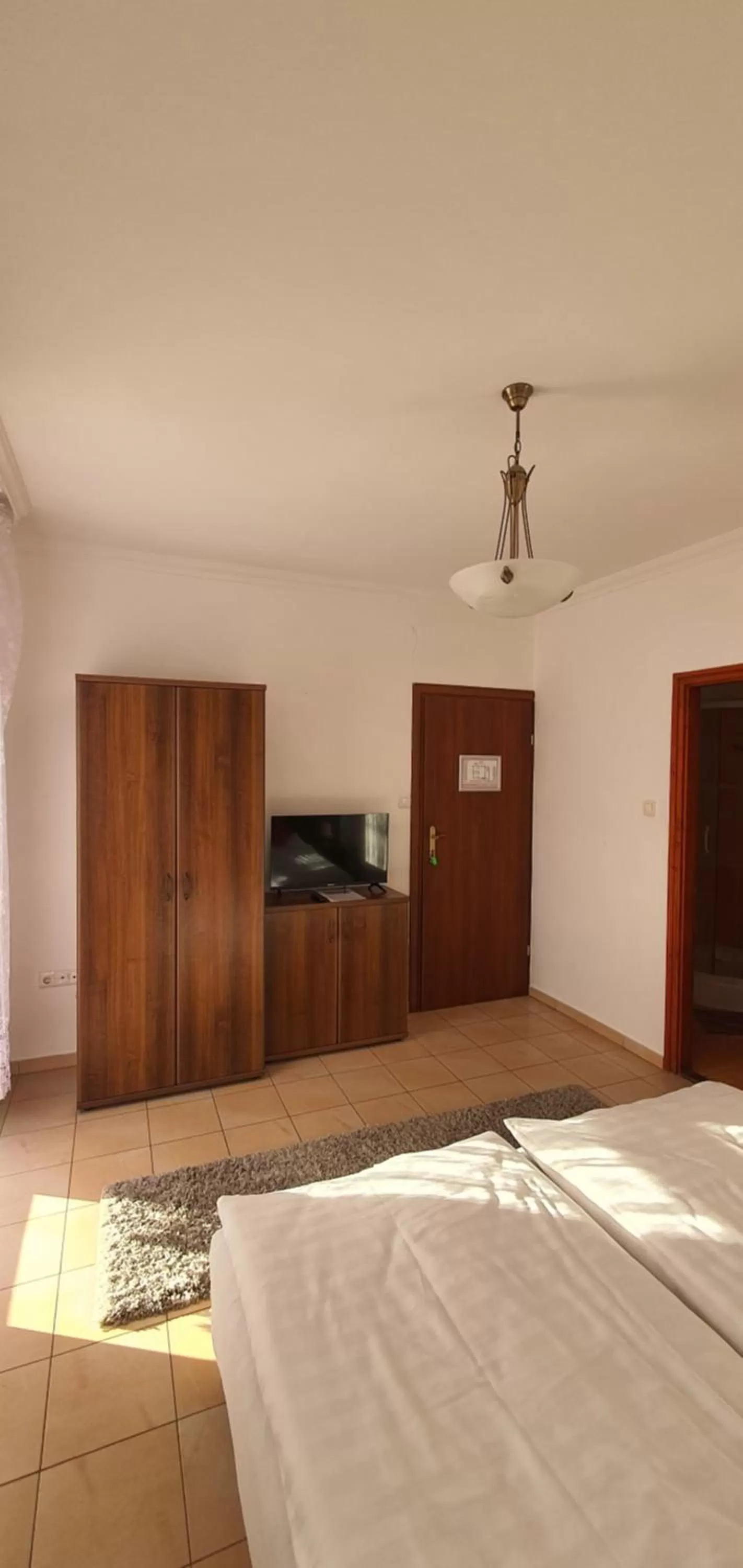 Bed in Aqua Oazis Apartman