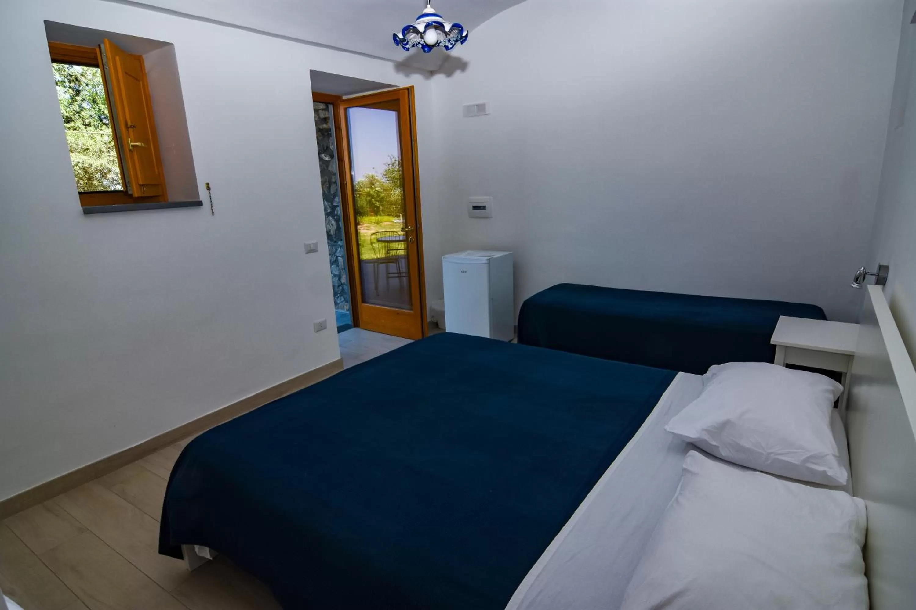 Photo of the whole room, Bed in Villa Mariagiovanna