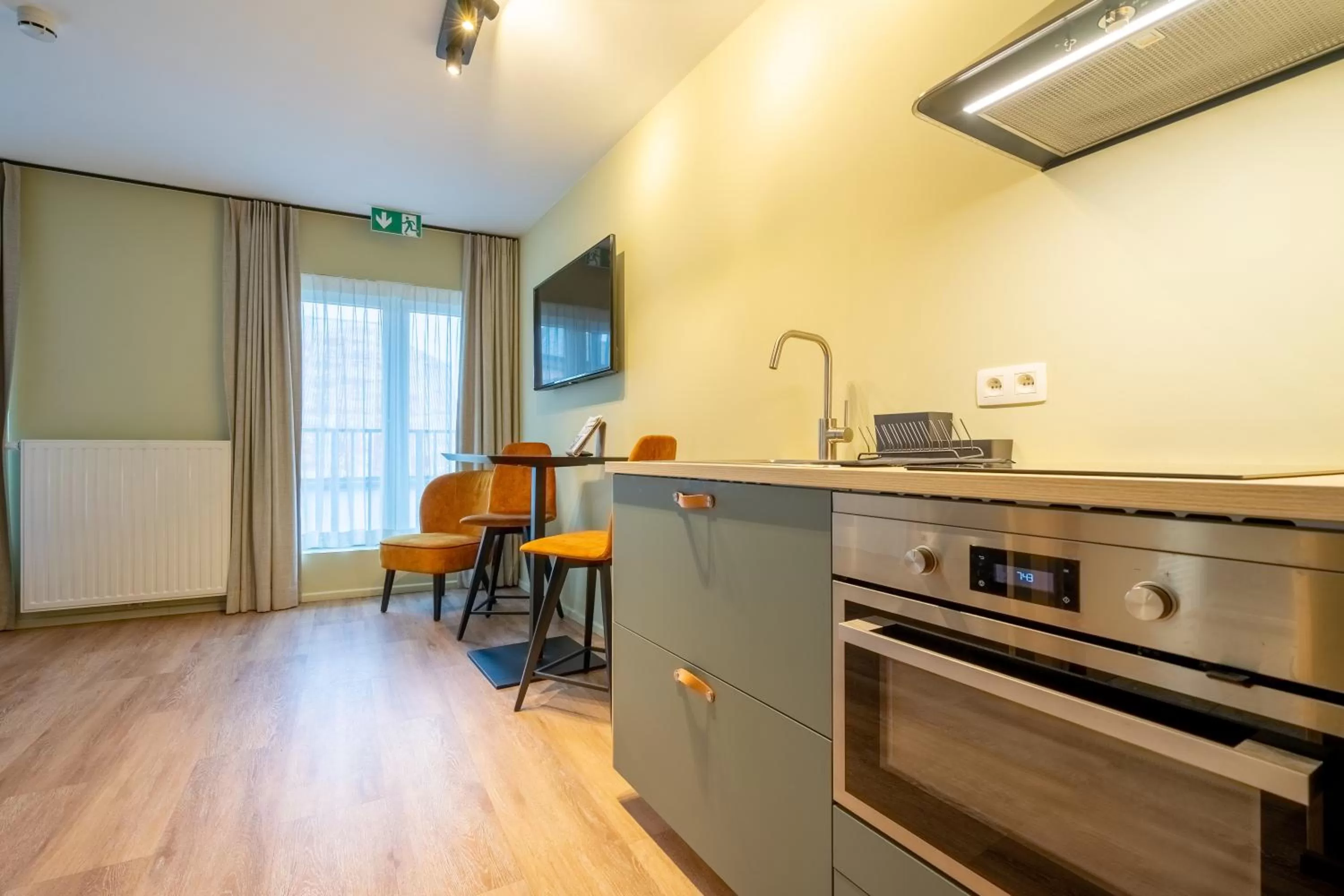 kitchen in Appart hôtel En Ville