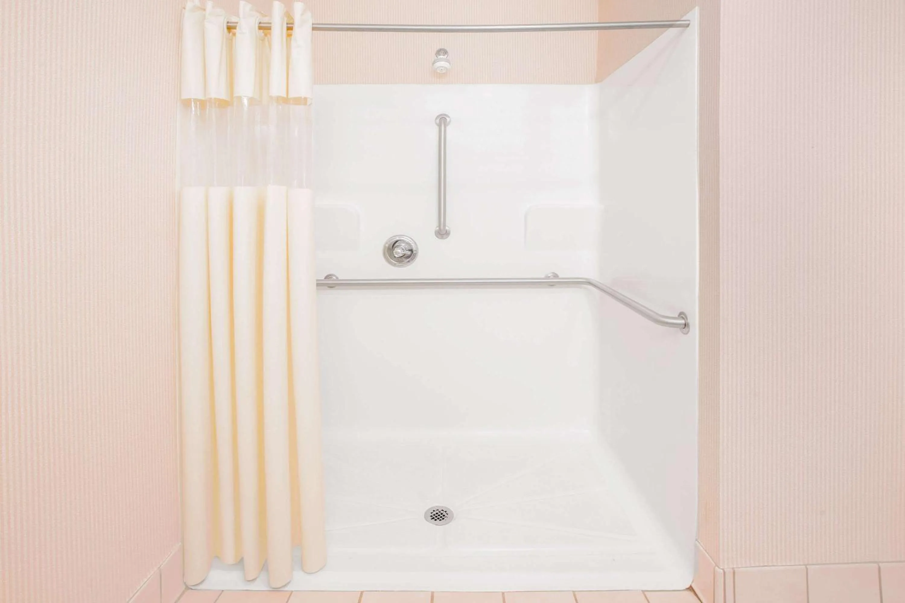 Bathroom in Days Inn by Wyndham Hattiesburg MS