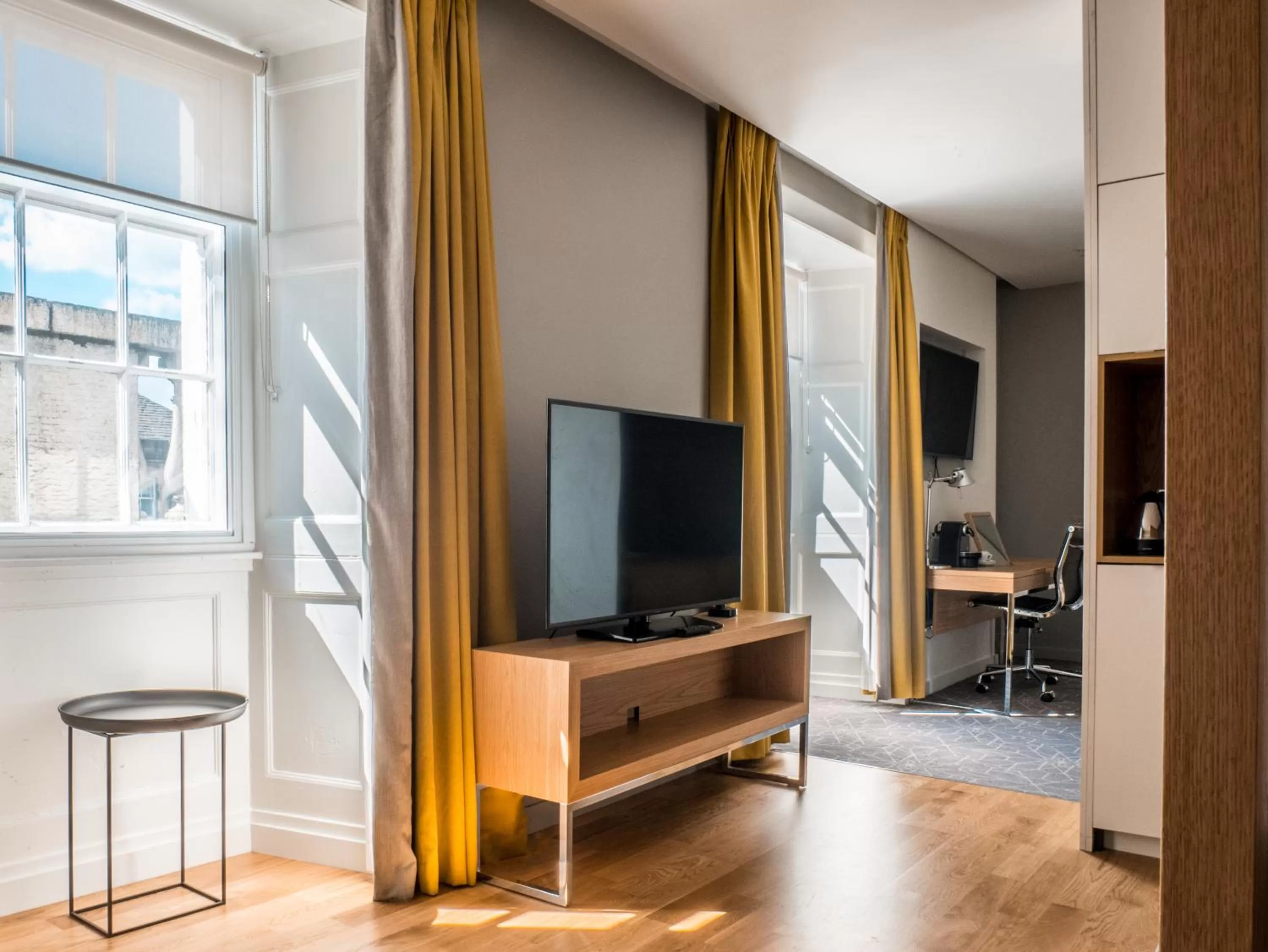 Communal lounge/ TV room in Apex Waterloo Place Hotel