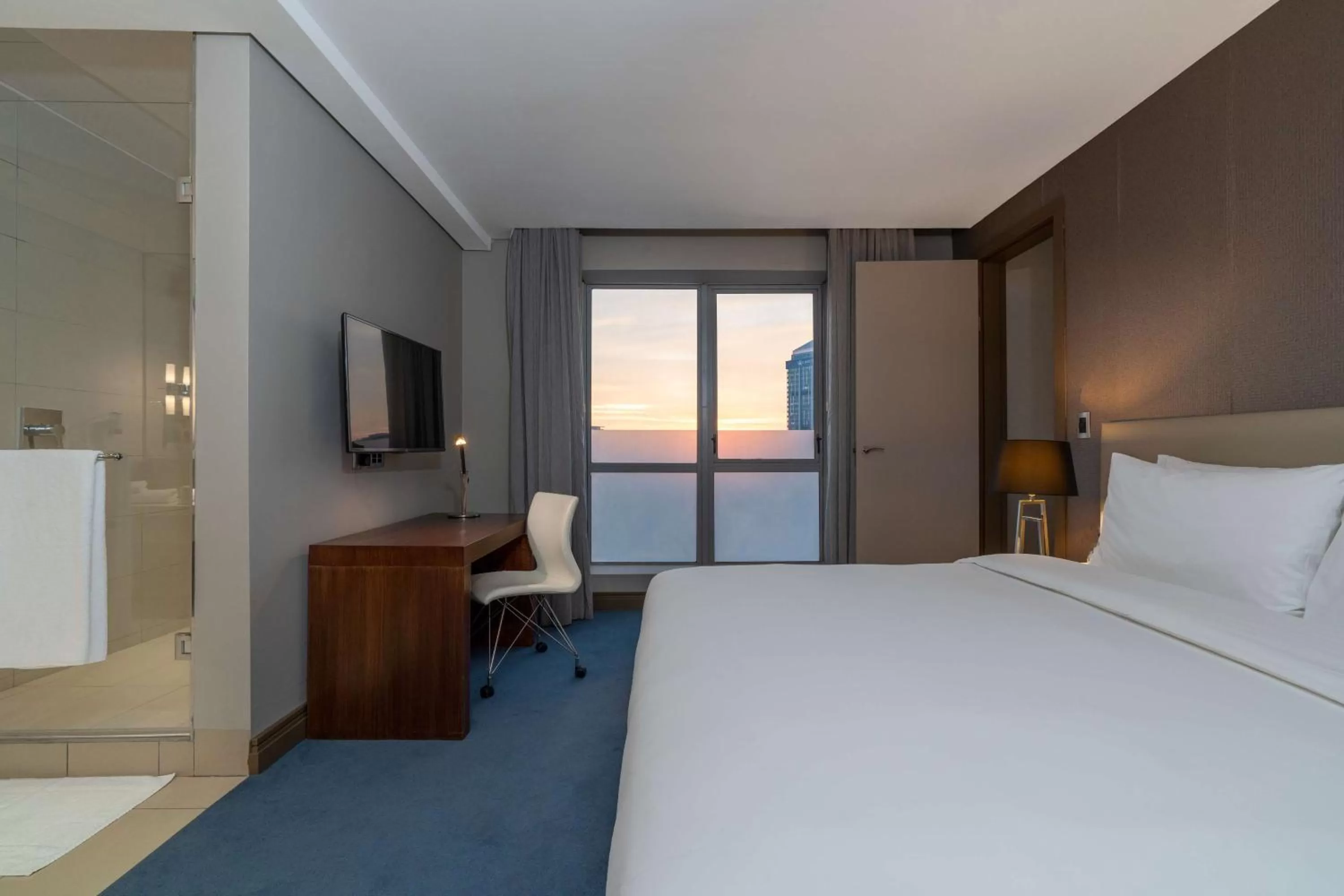 Photo of the whole room, Bed in Radisson Blu Gautrain Hotel, Sandton Johannesburg