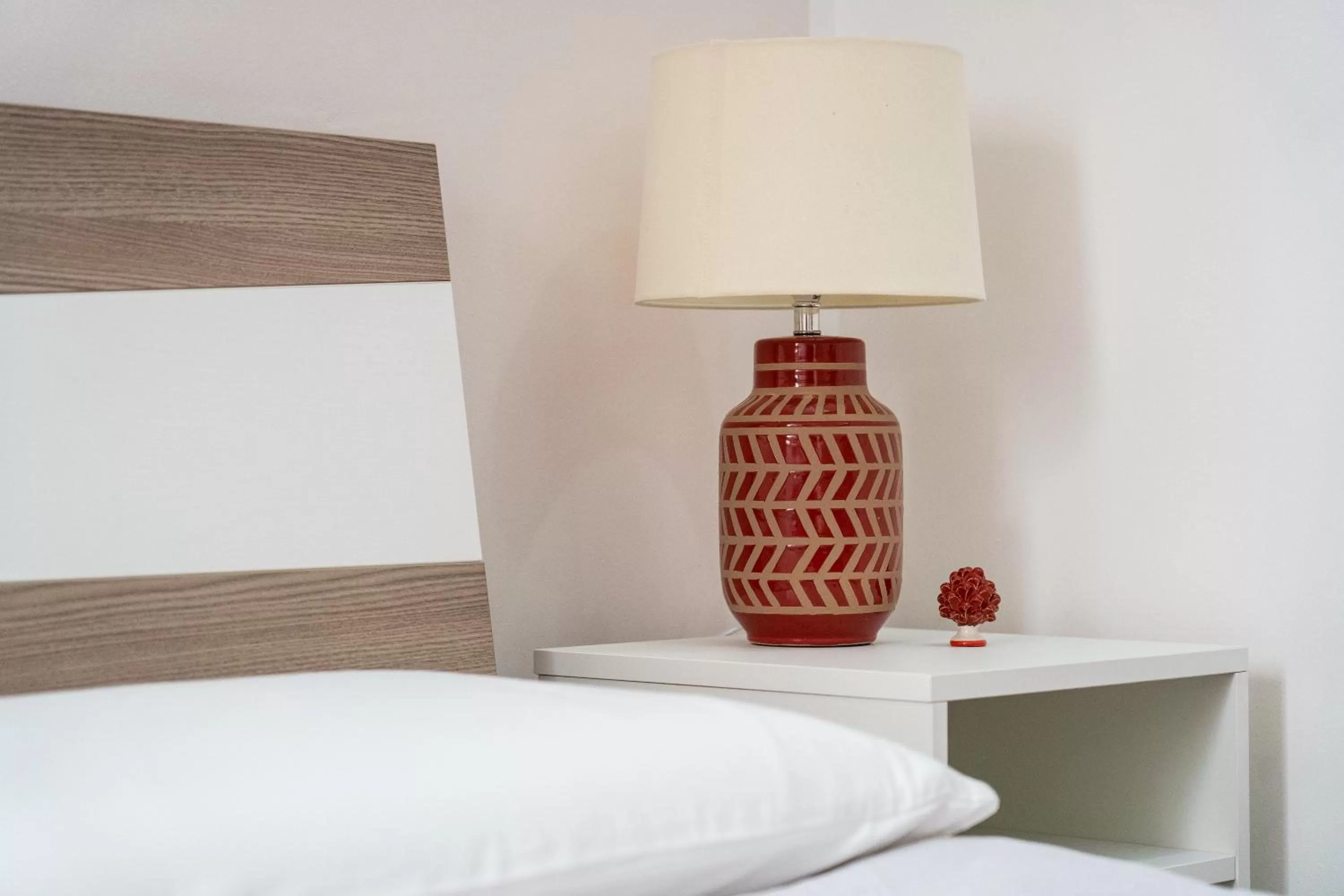 Bed in Portosalvo Rooms