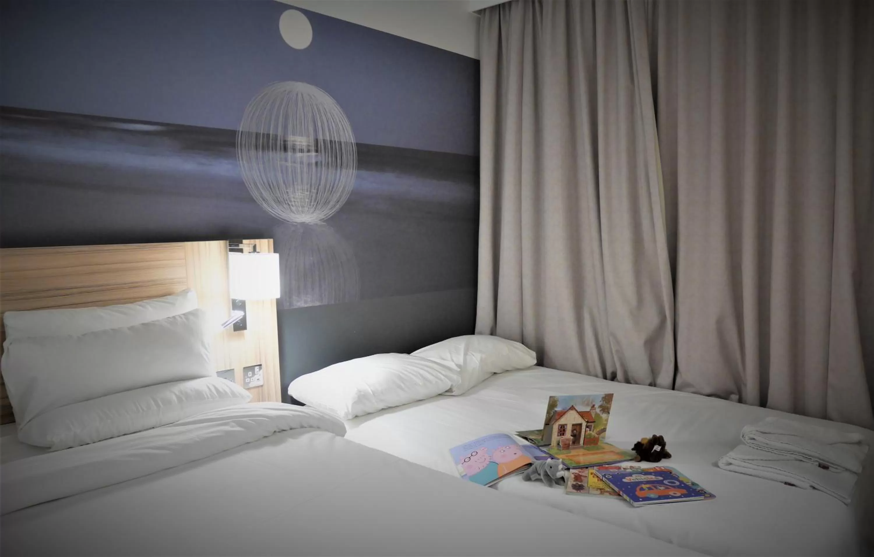 Bed in Novotel London Stansted Airport