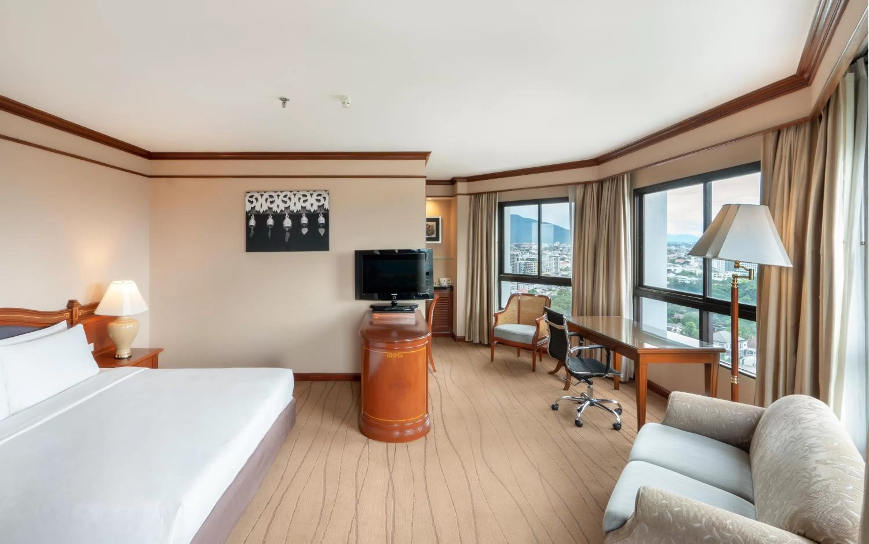 Bed in Centara Riverside Hotel Chiang Mai